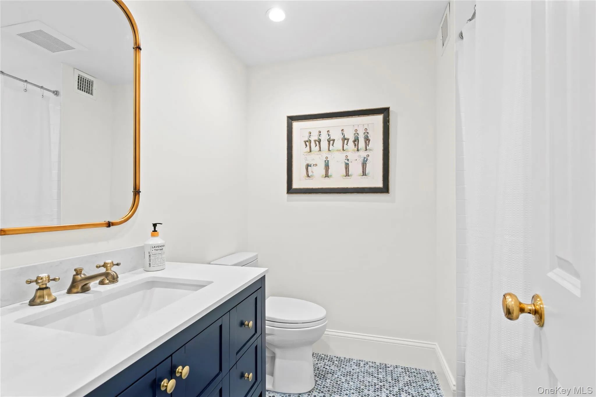 Full bathroom with vanity, toilet, tile patterned flooring, a shower with curtain, and recessed lighting. Full bathroom with vanity, toilet, tile patterned flooring, a shower with curtain, and recessed lighting.