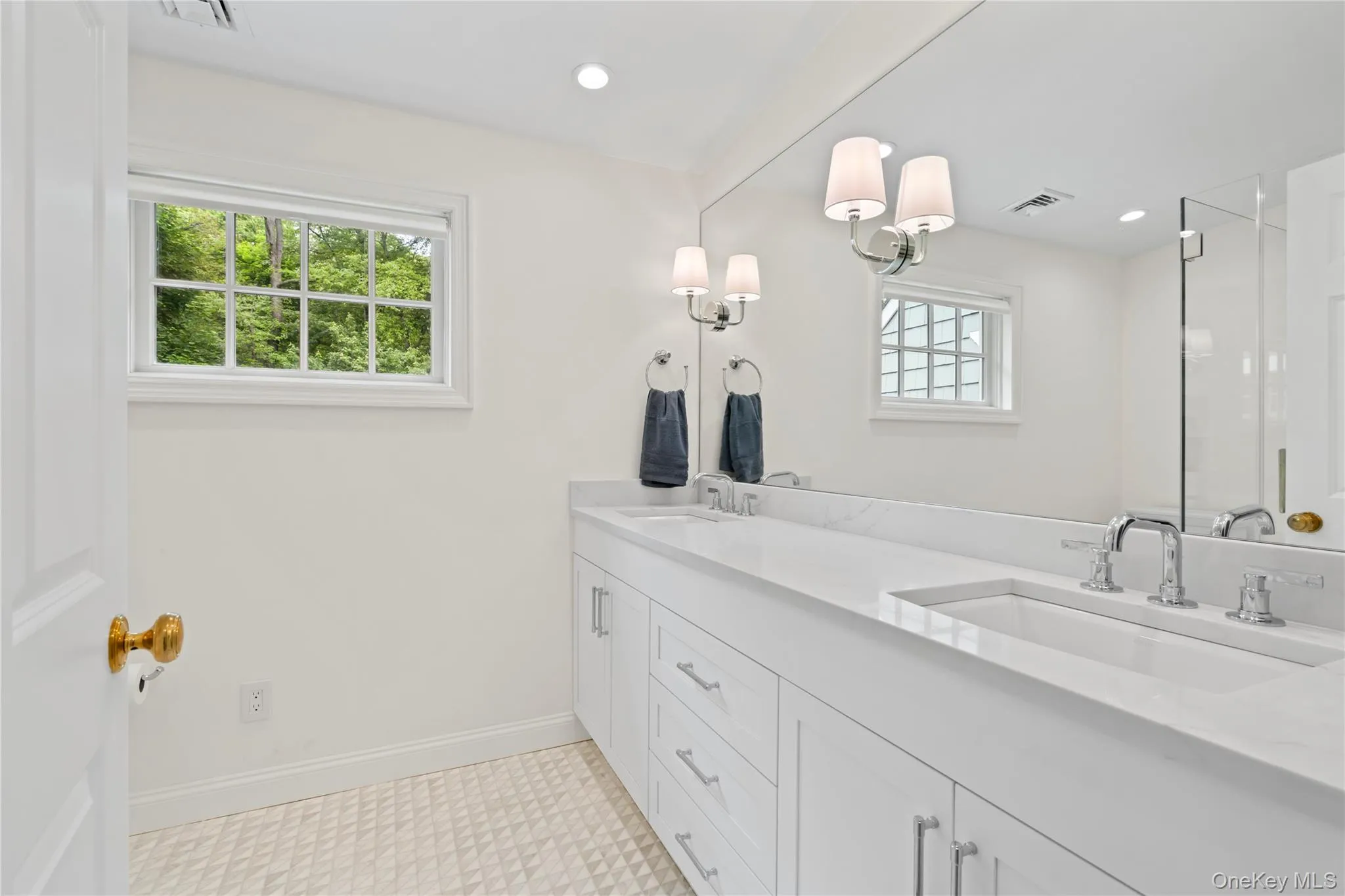 Second floor Guest Bathroom with Double Vanity and Shower. Second floor Guest Bathroom with Double Vanity and Shower.