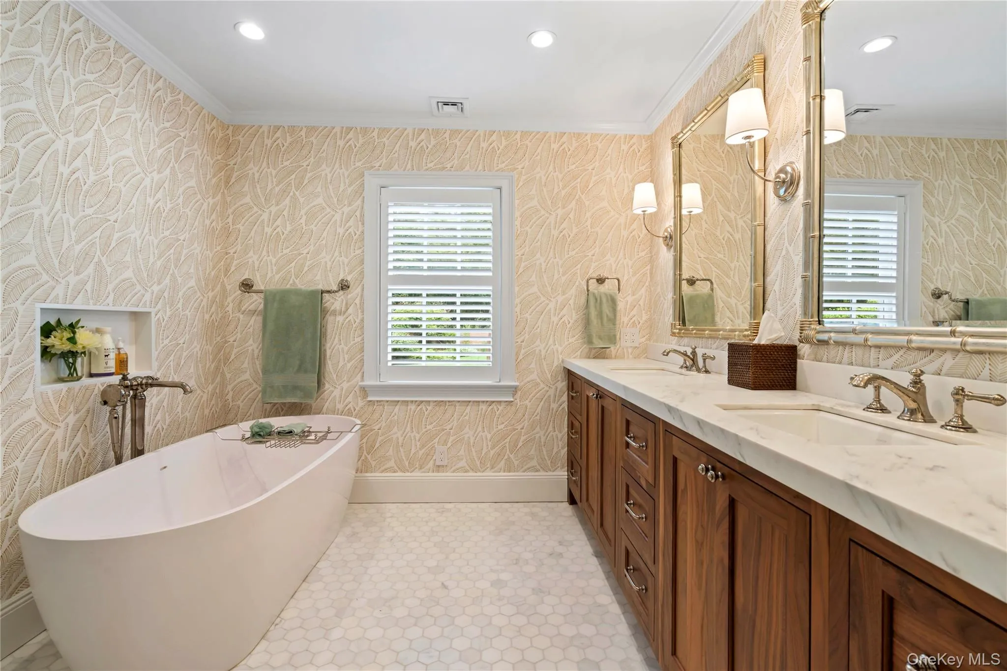 Primary bathroom with double vanity, a large shower, soaking tub and heated tile floors. Primary bathroom with double vanity, a large shower, soaking tub and heated tile floors.