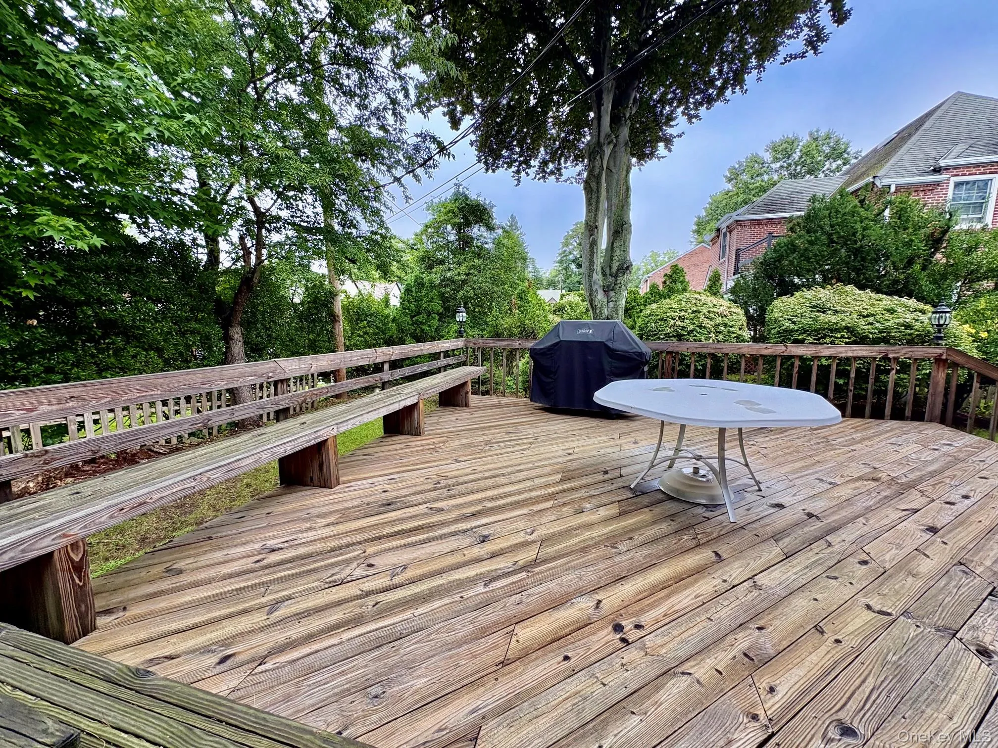 Oversized wood deck. Family room sliding door with easy access to breakfast room, kitchen amd family room Oversized wood deck. Family room sliding door with easy access to breakfast room, kitchen amd family room