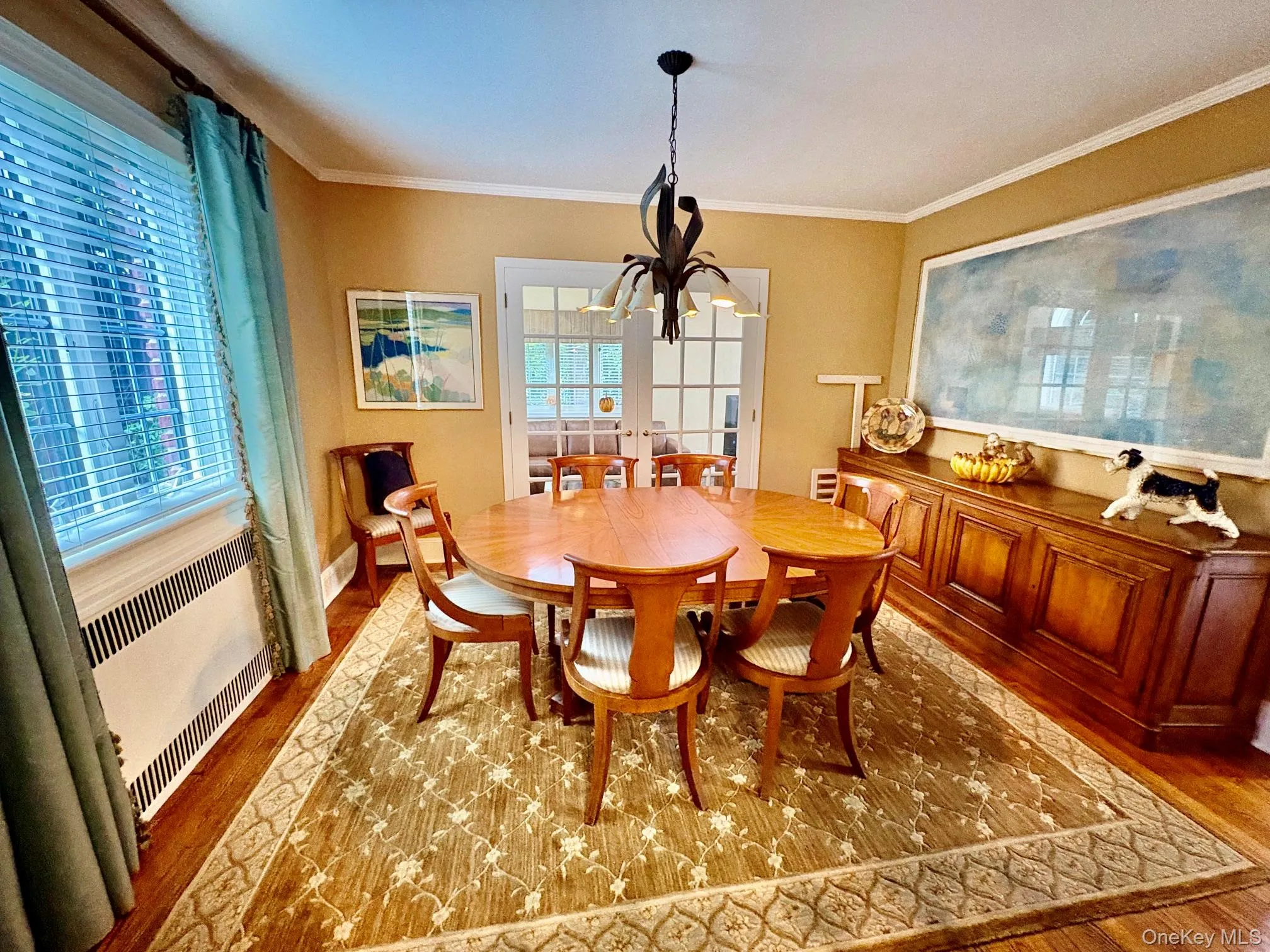 Formal dining room with french doors to family room Formal dining room with french doors to family room