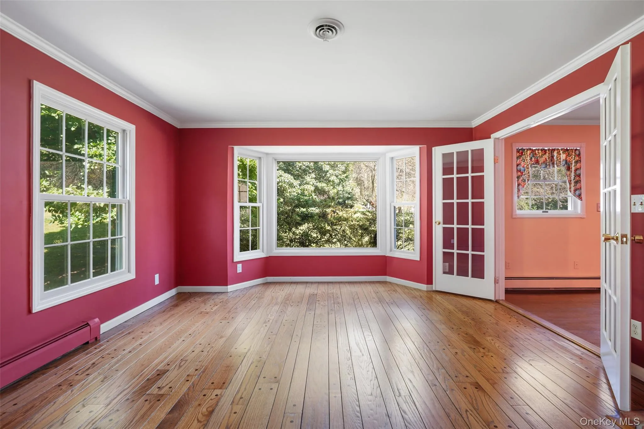 With original pegged hardwood floors, bay window, French Doors to Family Room With original pegged hardwood floors, bay window, French Doors to Family Room