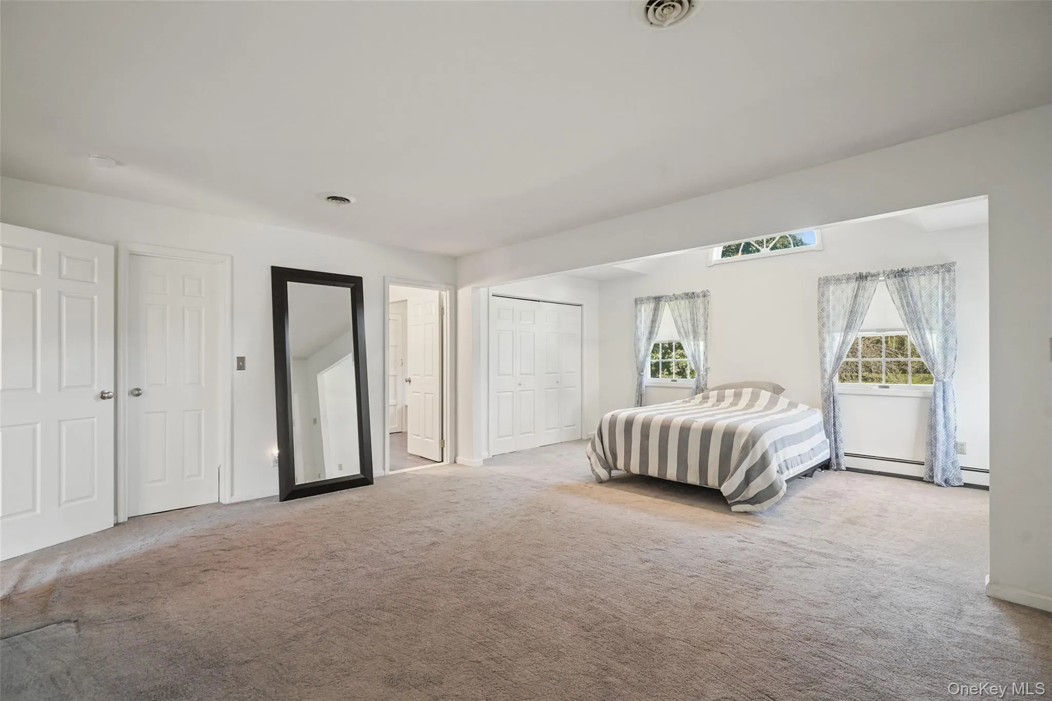 With cathedral ceiling, en-suite bathroom and 2 large closets. With cathedral ceiling, en-suite bathroom and 2 large closets.