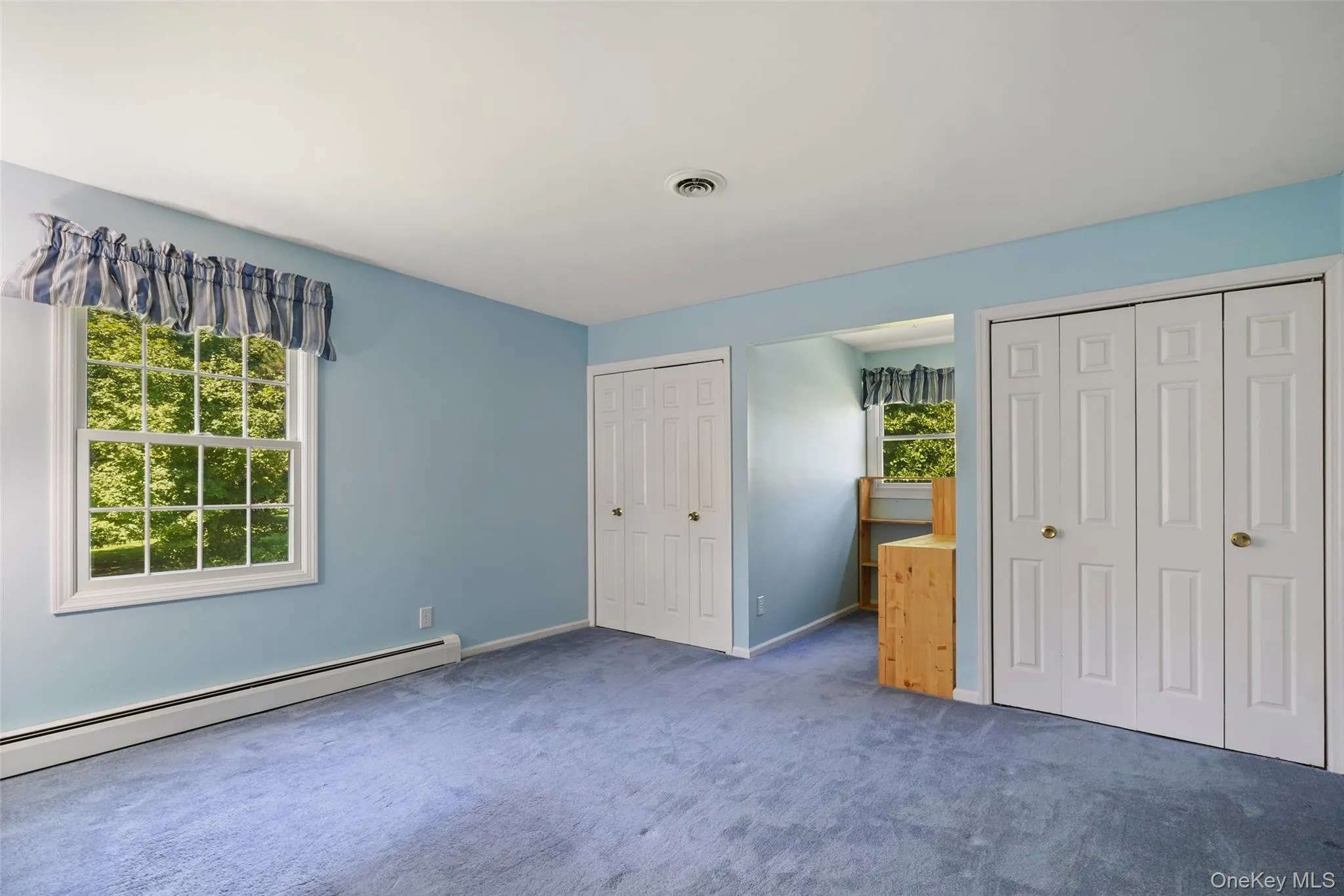 With large double closets. Hardwood floors under carpet. With large double closets. Hardwood floors under carpet.