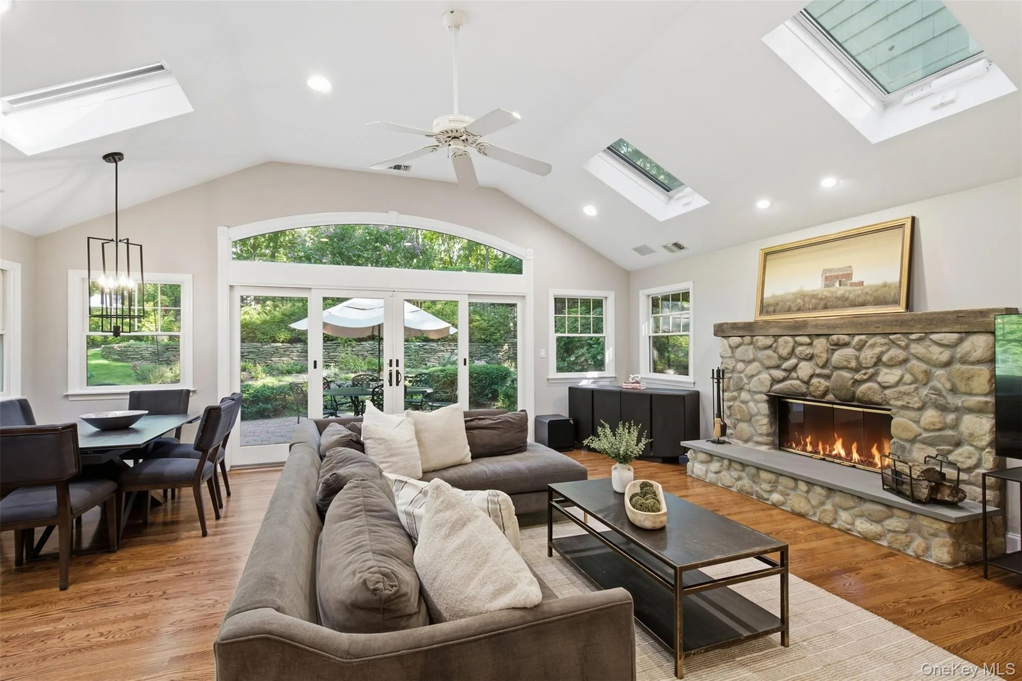 Bright Living Room With Wood Burning Fireplace Bright Living Room With Wood Burning Fireplace