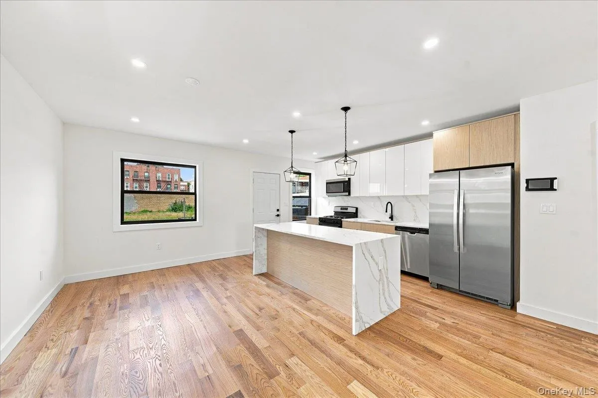 beautiful kitchen and formal dining area beautiful kitchen and formal dining area