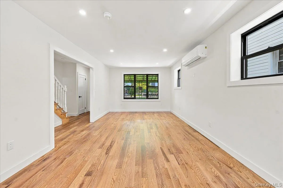 Open, bright and airy living room, new wood floors, new windows, split system heat & air! Open, bright and airy living room, new wood floors, new windows, split system heat & air!