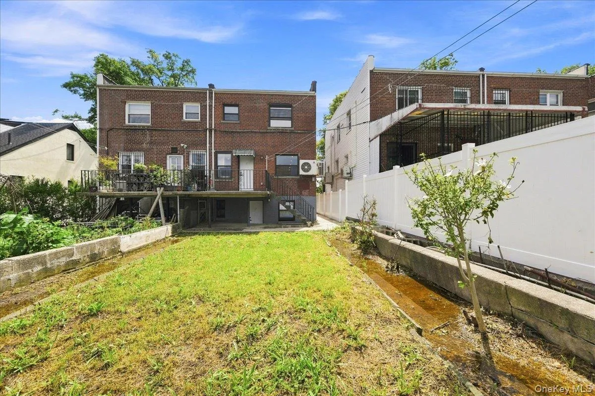 View of the rear of the home from expansive yard. Lovely rear porch too! View of the rear of the home from expansive yard. Lovely rear porch too!
