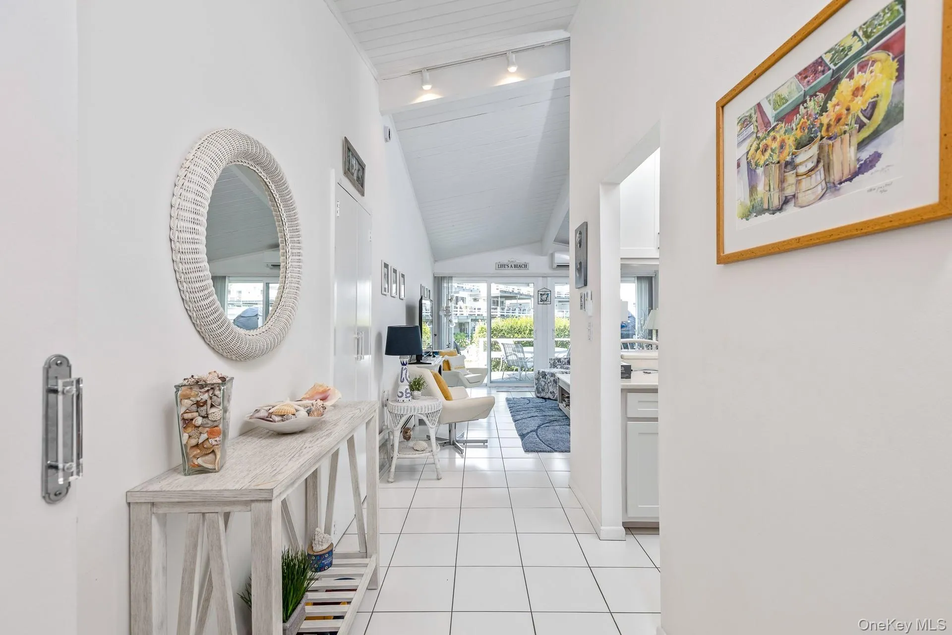 Vaulted ceiling Entry Foyer with recessed lighting, and Ceramic tile flooring Vaulted ceiling Entry Foyer with recessed lighting, and Ceramic tile flooring