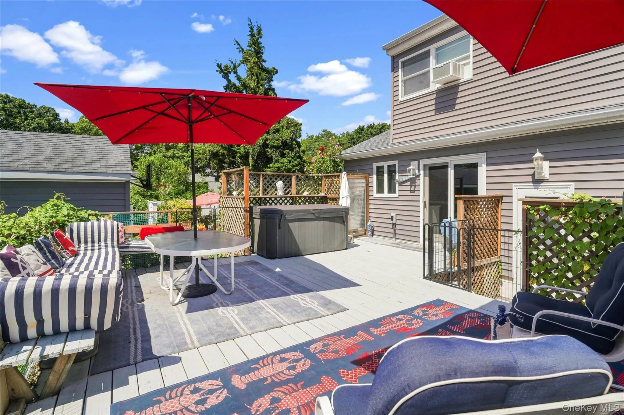 Backyard Featuring a Hot Tub on the Deck Backyard Featuring a Hot Tub on the Deck