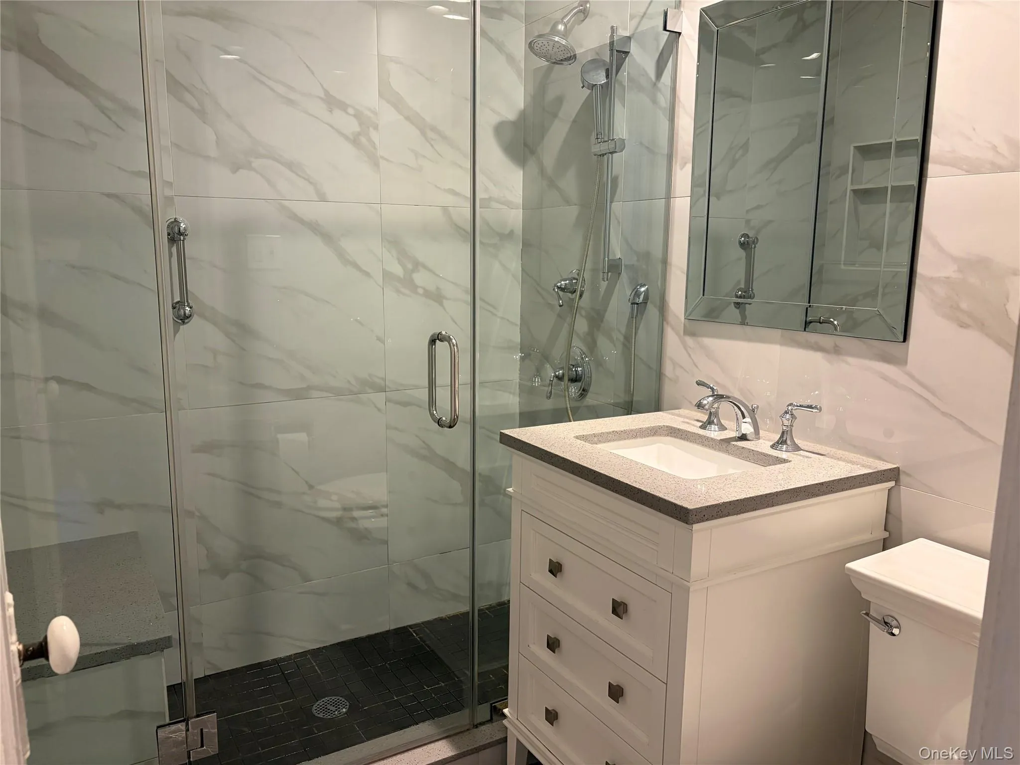 Renovated Main Floor Full Bath with Radiant Heated Floors Renovated Main Floor Full Bath with Radiant Heated Floors