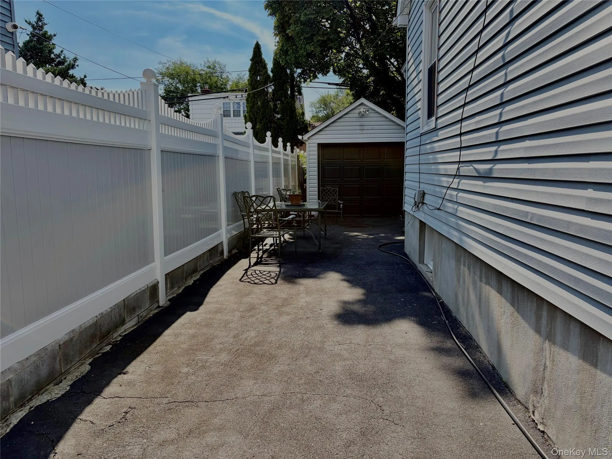 Side of Property leading to Garage Side of Property leading to Garage