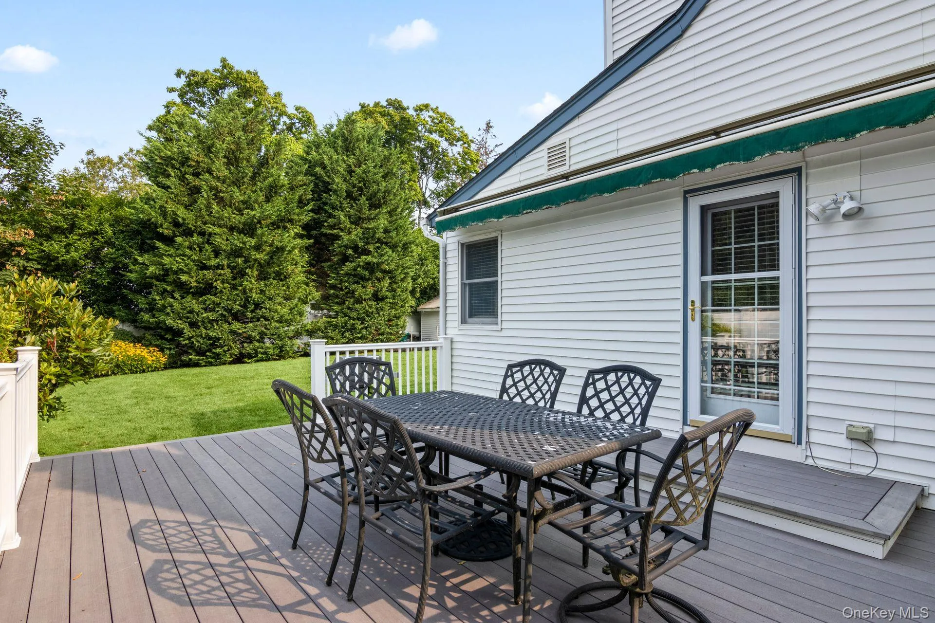 Deck Featuring Outdoor Dining Deck Featuring Outdoor Dining