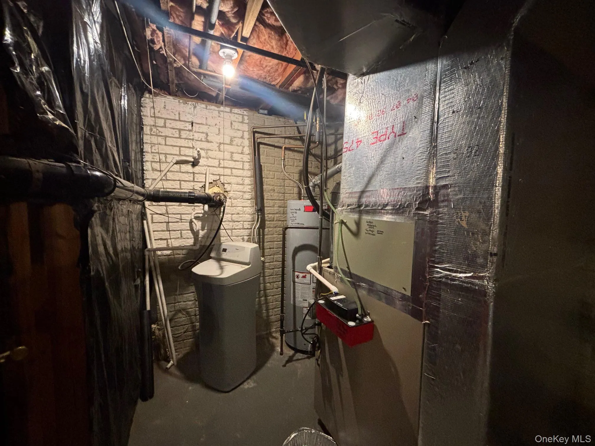 Basement- water softener. Basement- water softener.