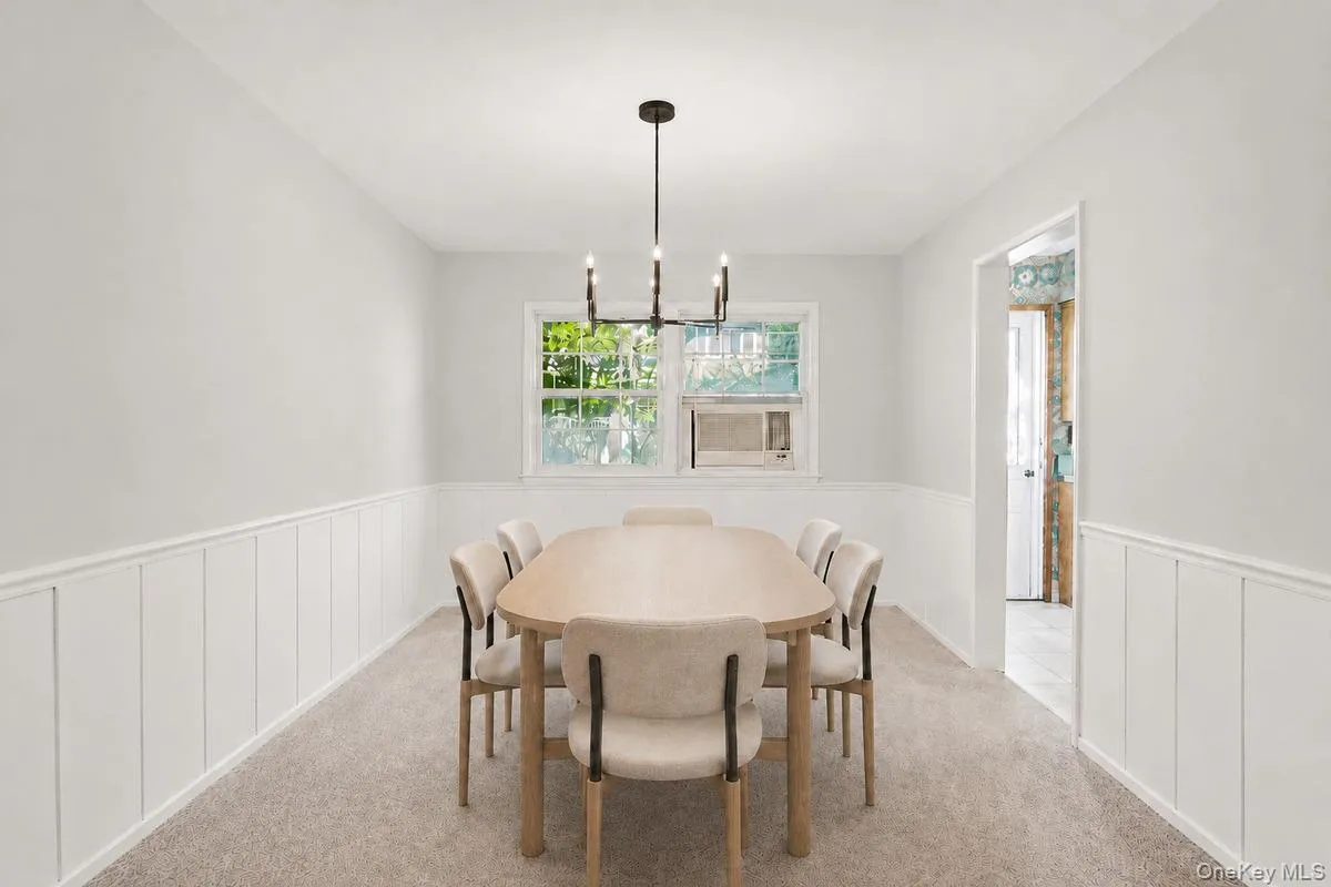 Virtually staged dining room just to Better show the space. Virtually staged dining room just to Better show the space.
