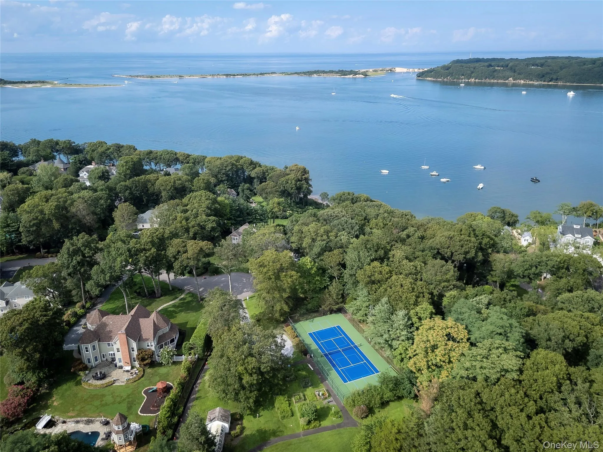 Village park with tennis, playground, gardens Village park with tennis, playground, gardens