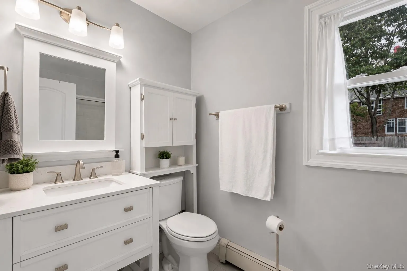 Updated primary bathroom with shower Updated primary bathroom with shower