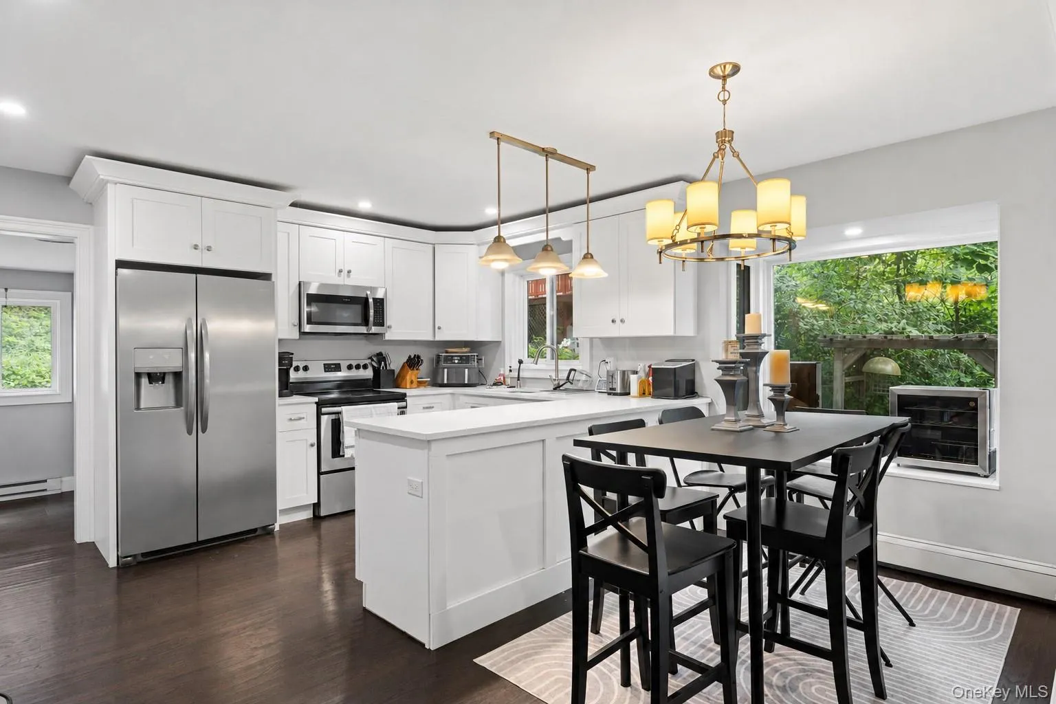 Fully upgraded kitchen with oversized picture window & dining area Fully upgraded kitchen with oversized picture window & dining area