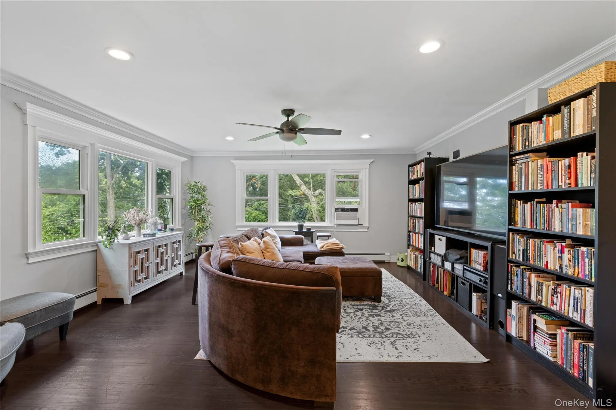 Family room fts. two picture windows affording great views of Port Jeff Harbor Family room fts. two picture windows affording great views of Port Jeff Harbor