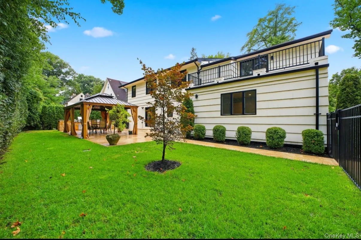 Private backyard retreat, spacious patio and elegant gazebo for effortless outdoor entertainment. Private backyard retreat, spacious patio and elegant gazebo for effortless outdoor entertainment.