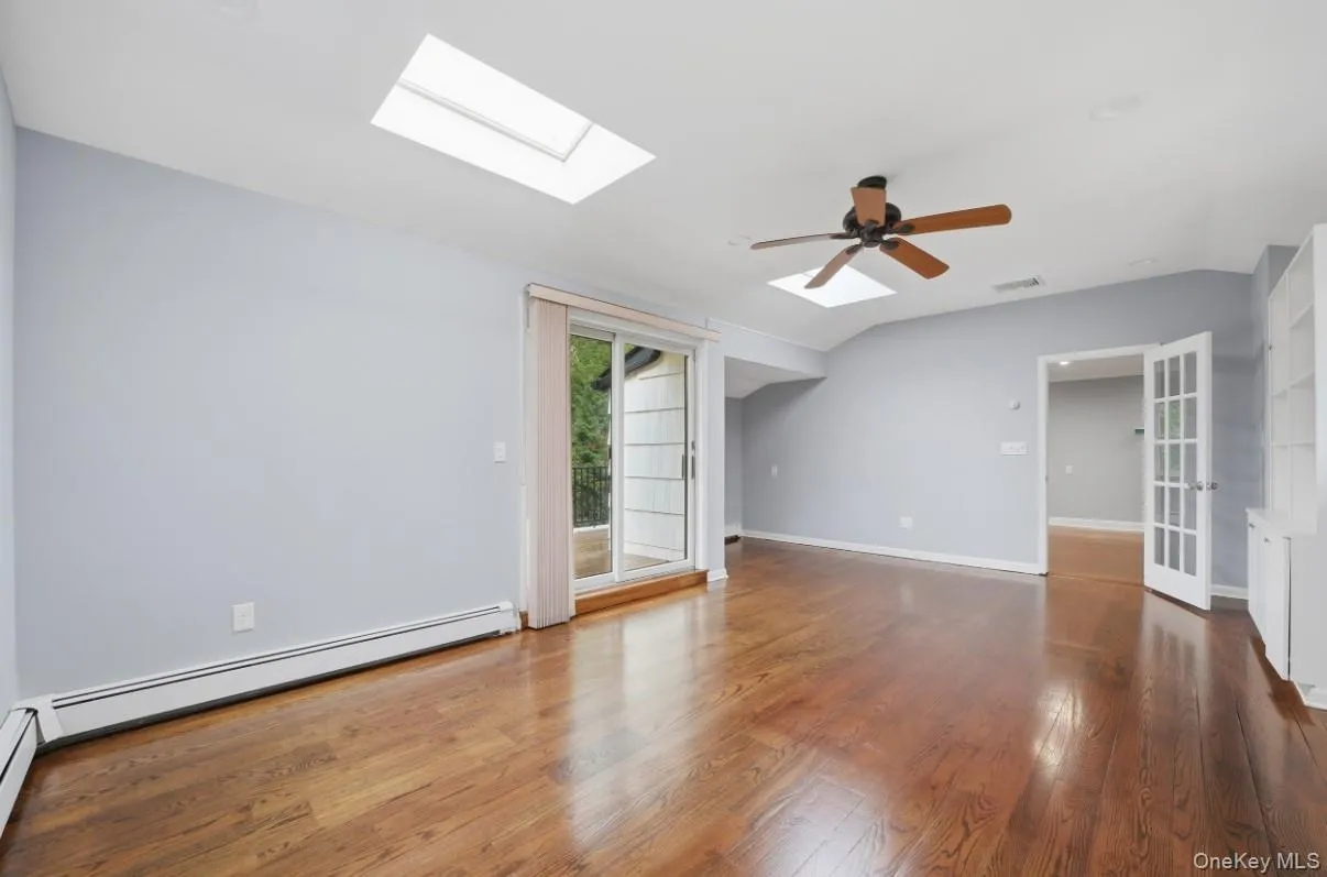 Skylights, hardwood floors, ceiling fan , and access to balcony Skylights, hardwood floors, ceiling fan , and access to balcony