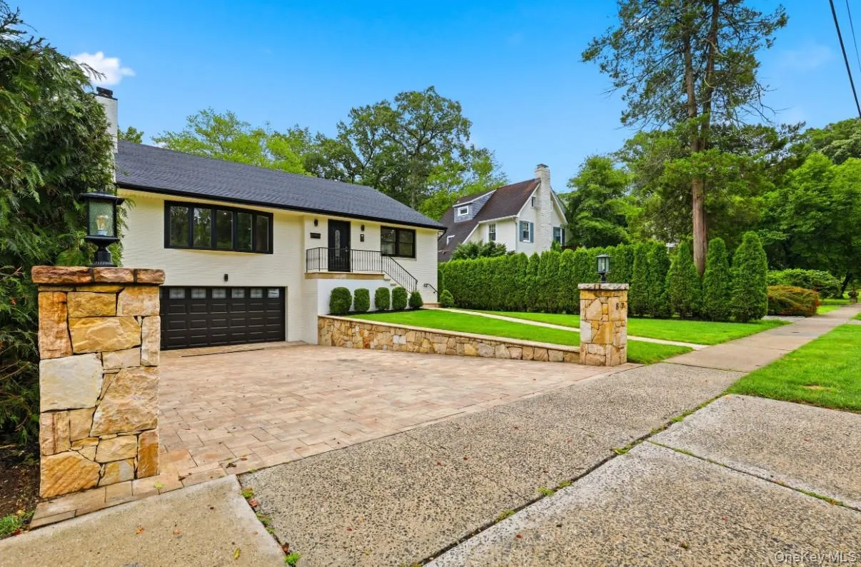 Spacious driveway and attached garage for impressive curb appeal. Spacious driveway and attached garage for impressive curb appeal.