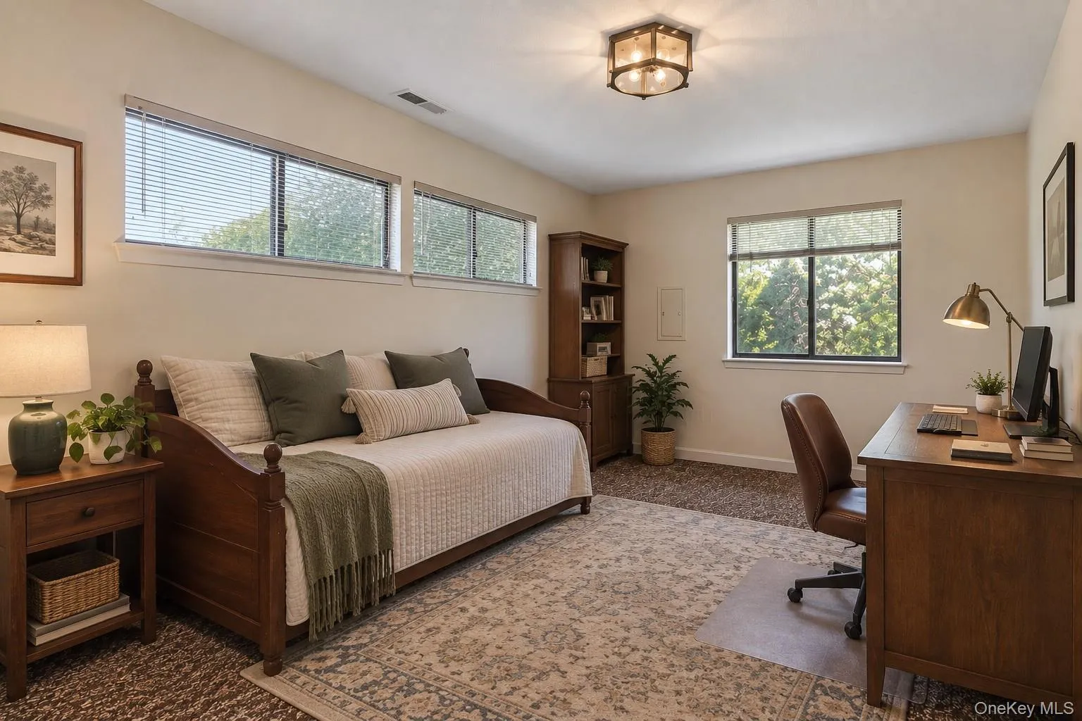 Fourth bedroom, lower level. Digitally staged, was used as an office. Fourth bedroom, lower level. Digitally staged, was used as an office.