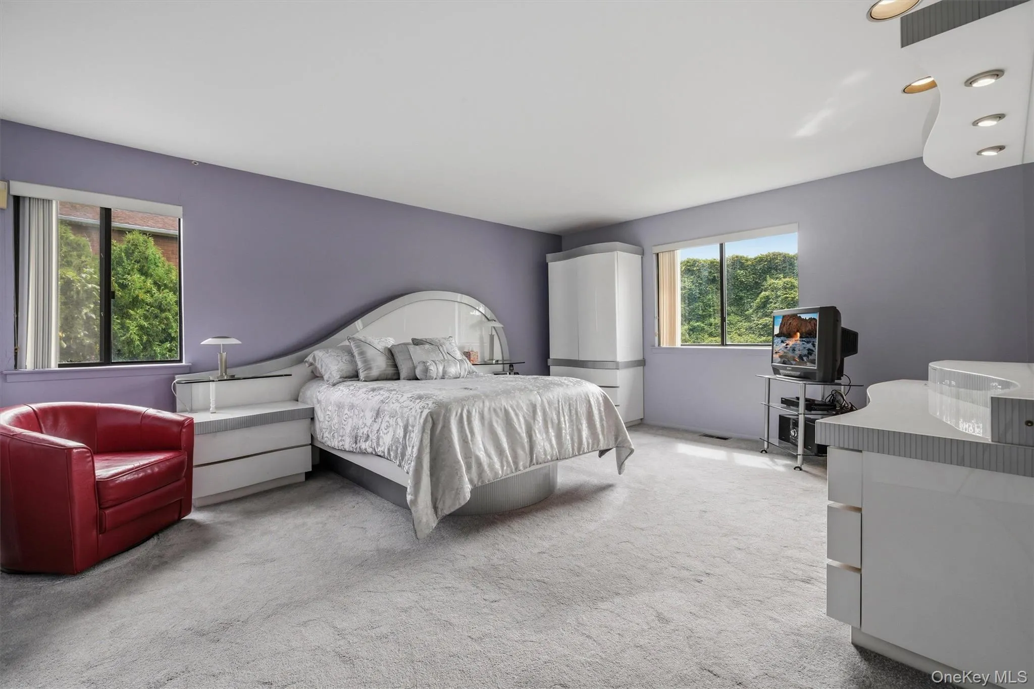 Enormous primary bedroom with attached bath and multiple closets. Enormous primary bedroom with attached bath and multiple closets.