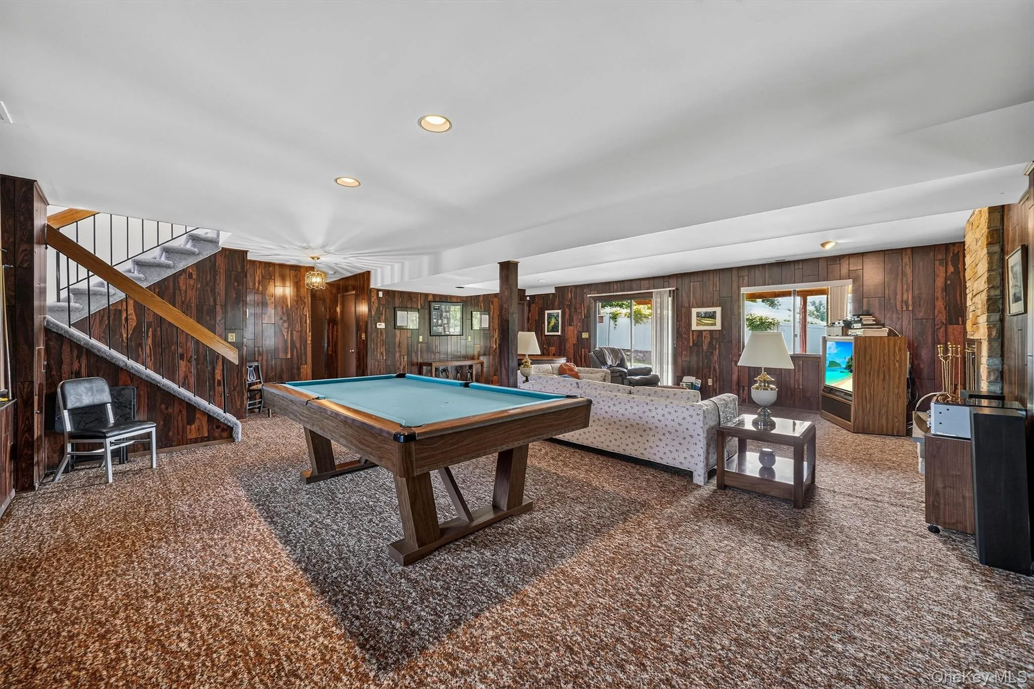 Lower level: Huge family room/den. Lower level: Huge family room/den.