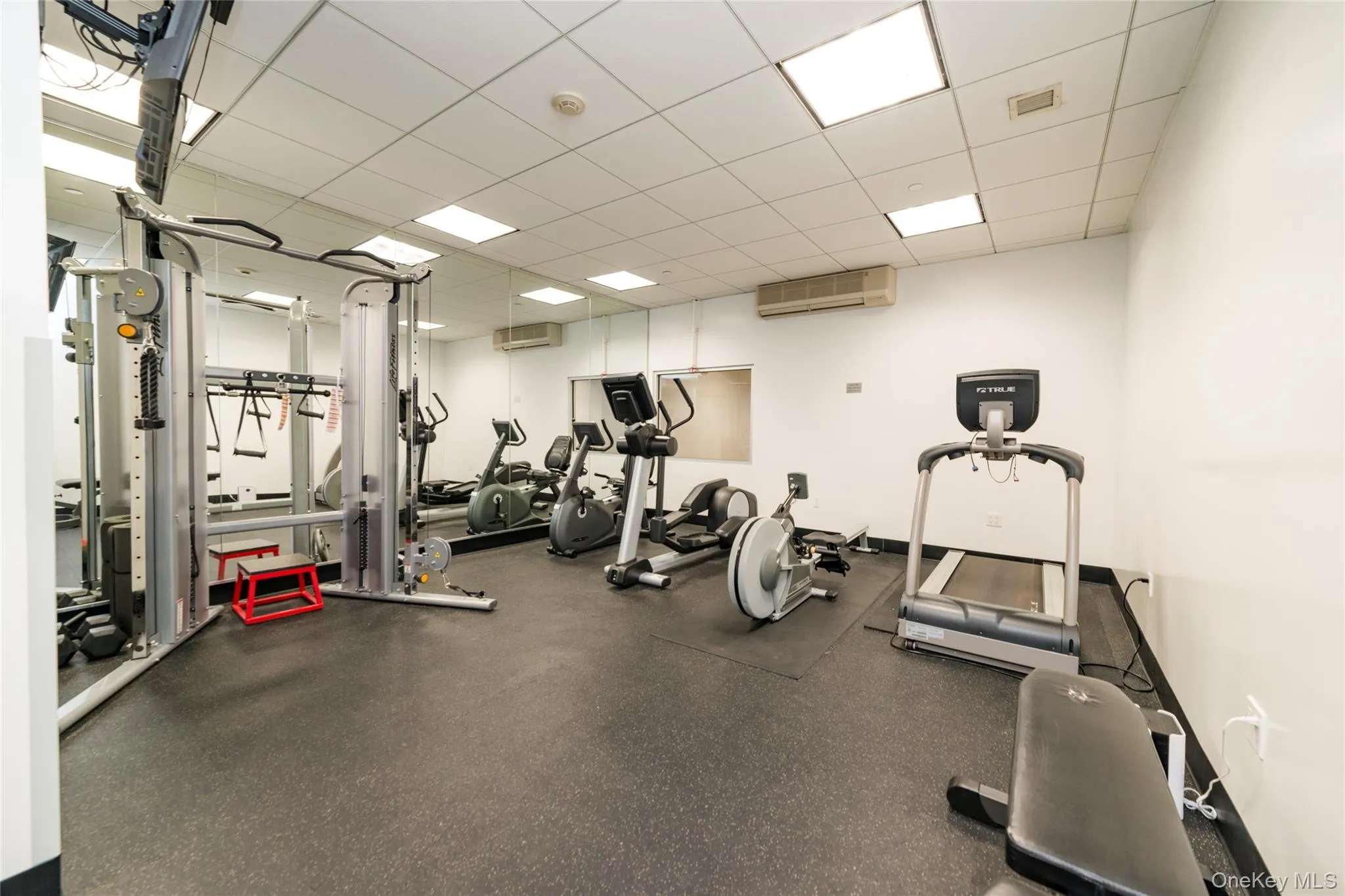 Fully equipped fitness center available for resident use Fully equipped fitness center available for resident use