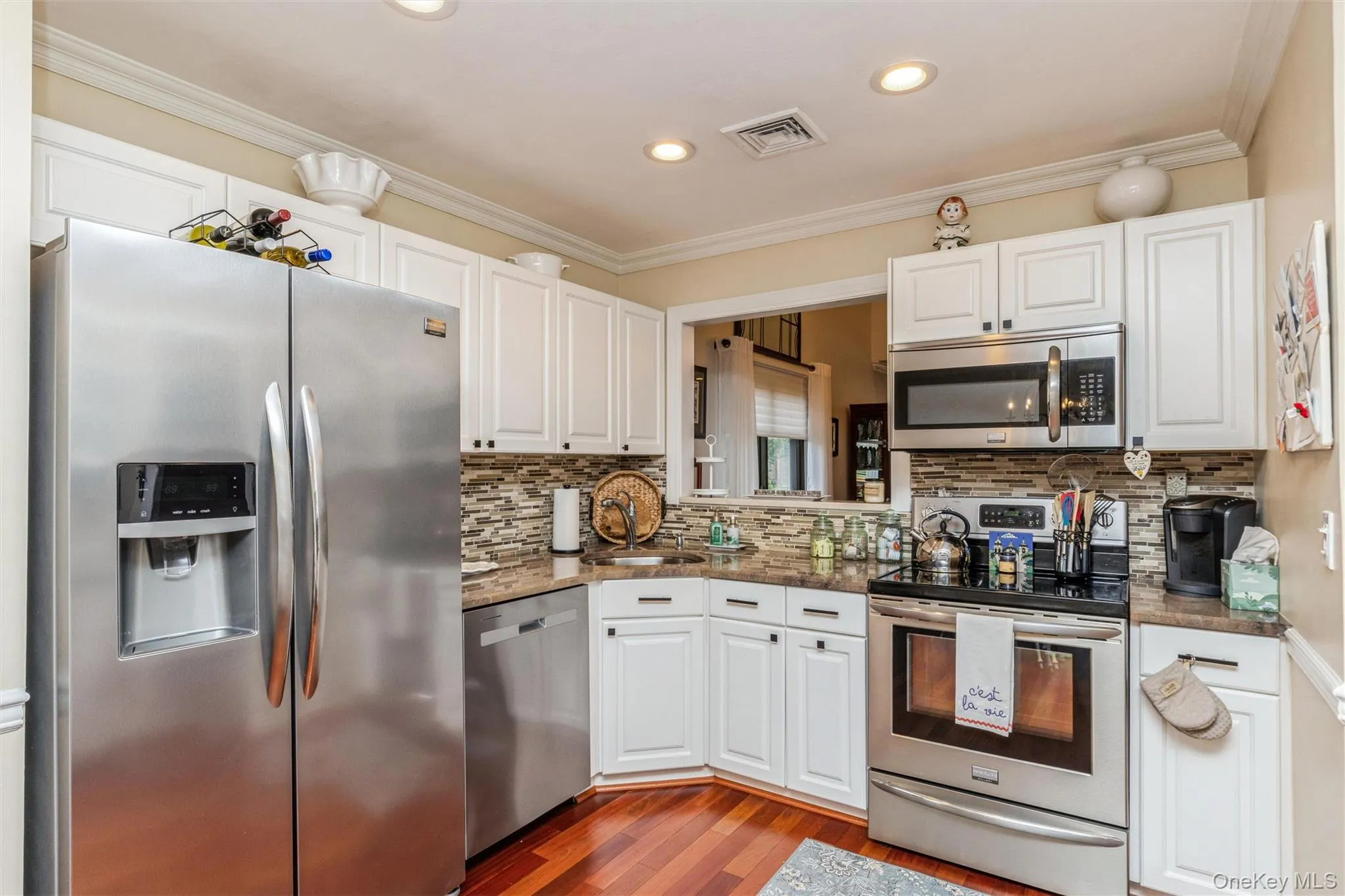 Stainless Steel Appliances with view into Dining Room Stainless Steel Appliances with view into Dining Room