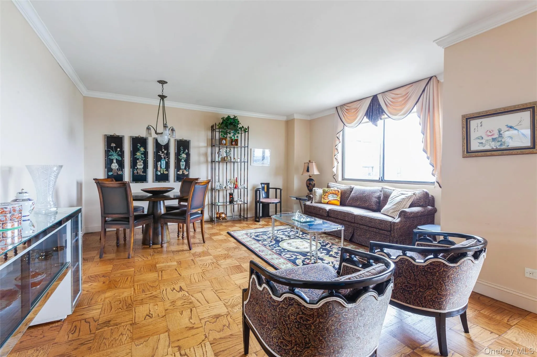 Parquet wood-finish flooring, crown molding, lots of natural light and sliders to balcony with amazing views Parquet wood-finish flooring, crown molding, lots of natural light and sliders to balcony with amazing views
