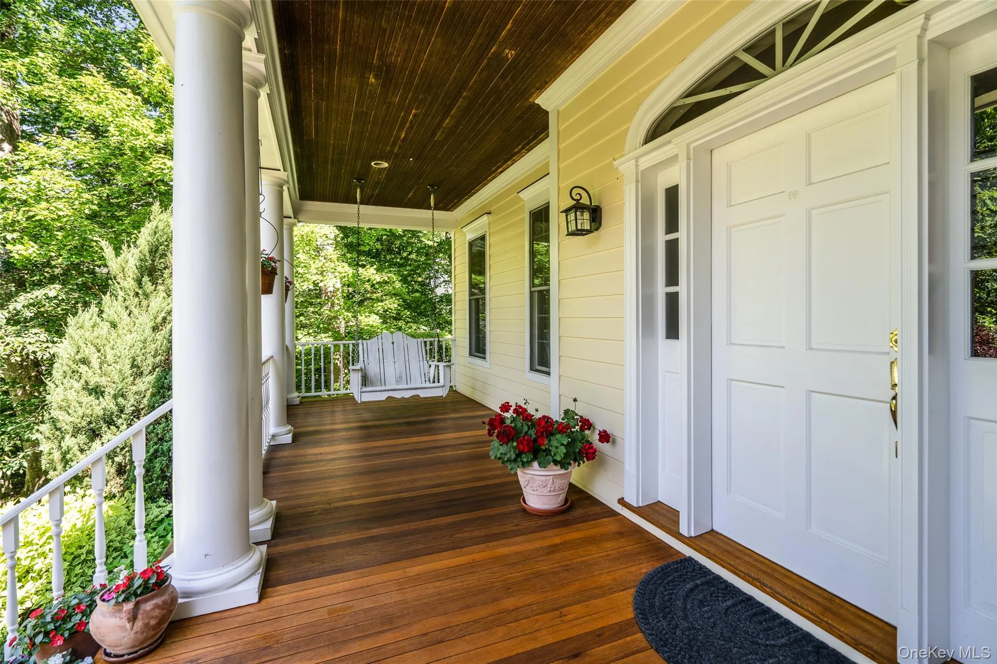 Your new favorite hangout: a wide, covered front porch made for coffee breaks and evening drinks, all with a beautiful view of your private lawn. Your new favorite hangout: a wide, covered front porch made for coffee breaks and evening drinks, all with a beautiful view of your private lawn.