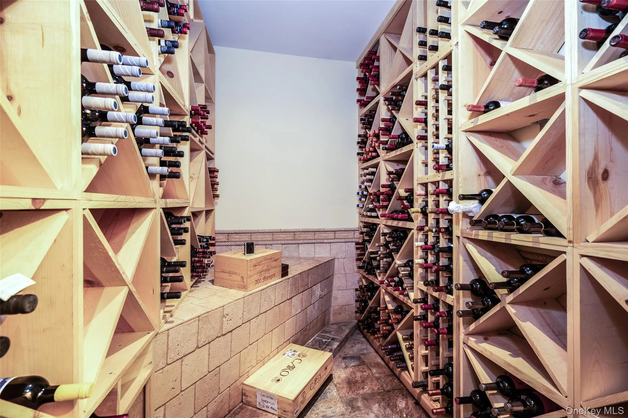 Wine storage tucked away in the lower level. Wine storage tucked away in the lower level.
