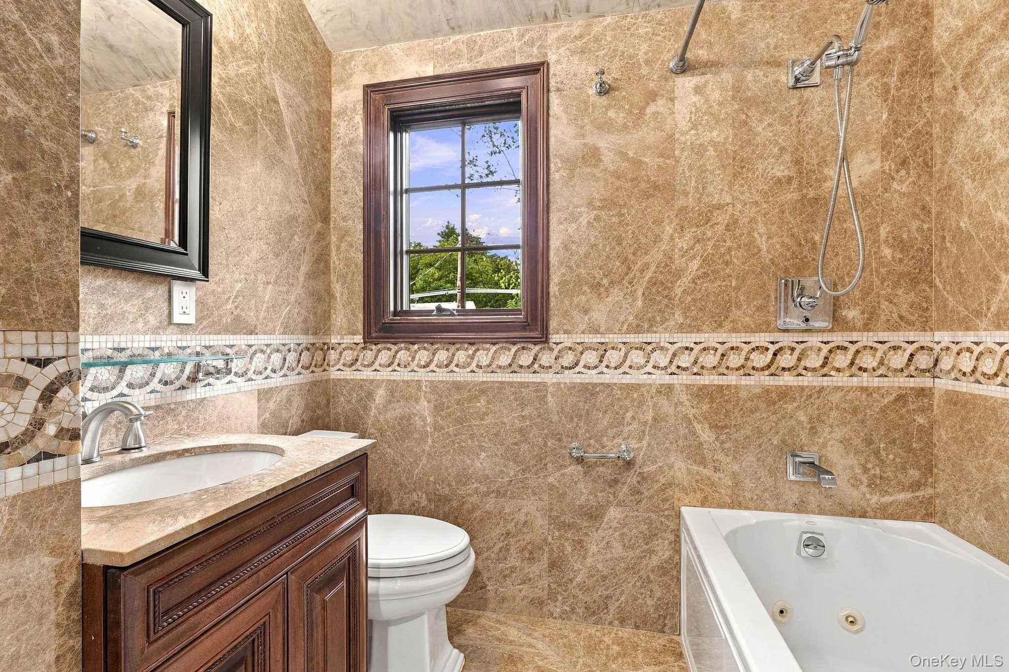 High-end finishes elevate the accessory apartment bath. High-end finishes elevate the accessory apartment bath.