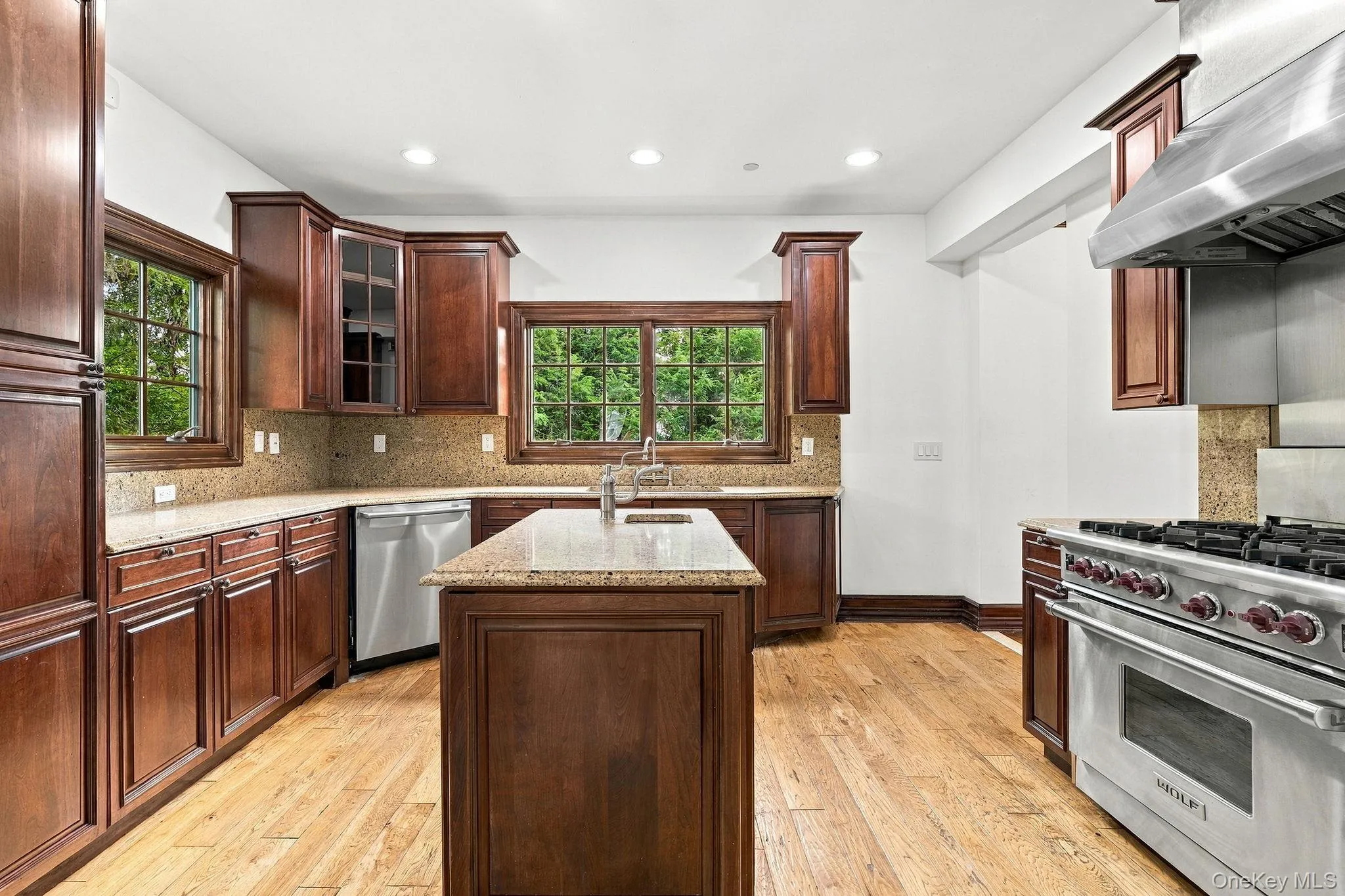 Granite, cherry cabinetry and high-end appliances come together beautifully. Granite, cherry cabinetry and high-end appliances come together beautifully.