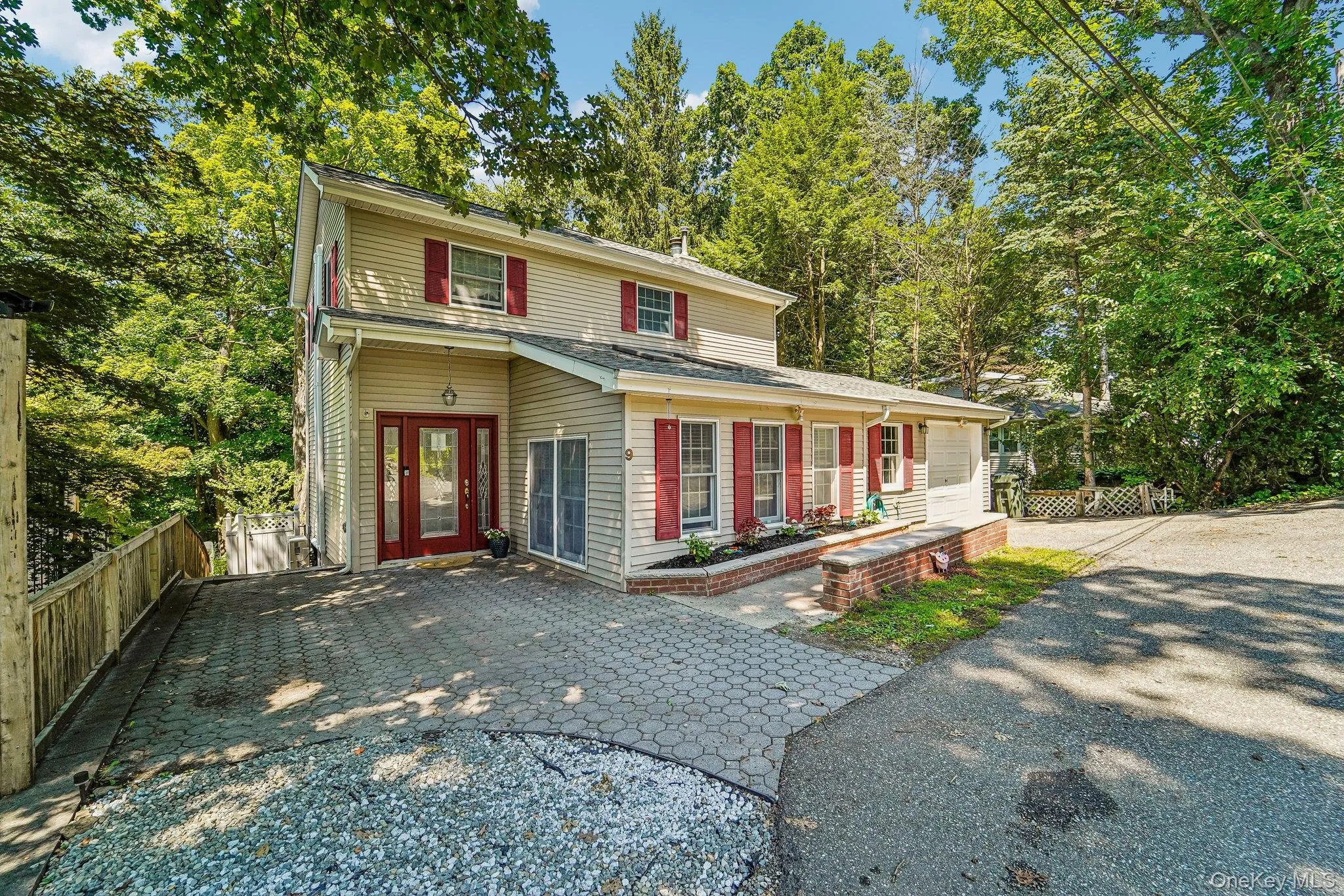 Easy access with level driveway space and room for 4 cars. Garage space plus driveway. Easy access with level driveway space and room for 4 cars. Garage space plus driveway.