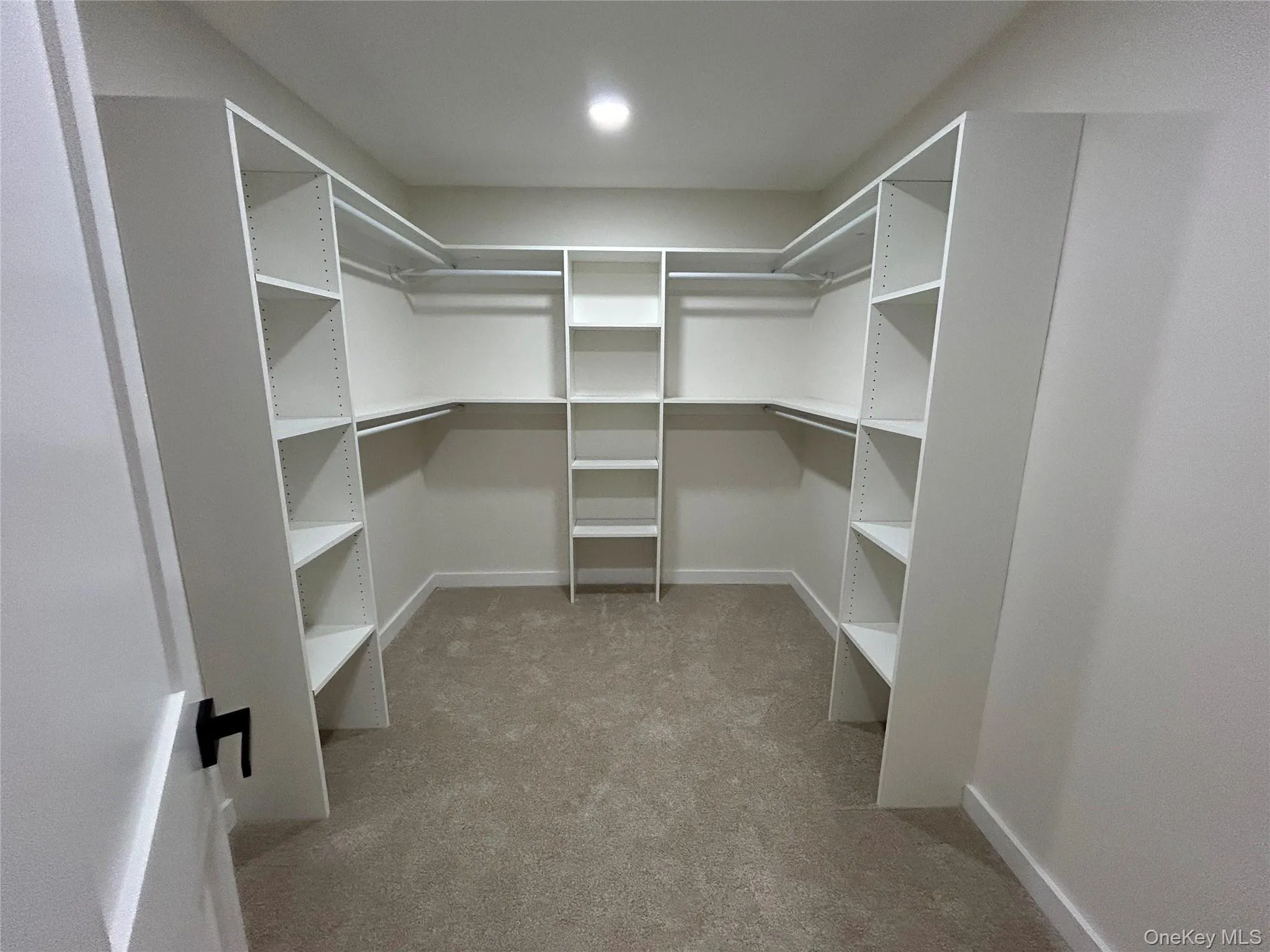 Primary Bedroom walk-n-closet Primary Bedroom walk-n-closet