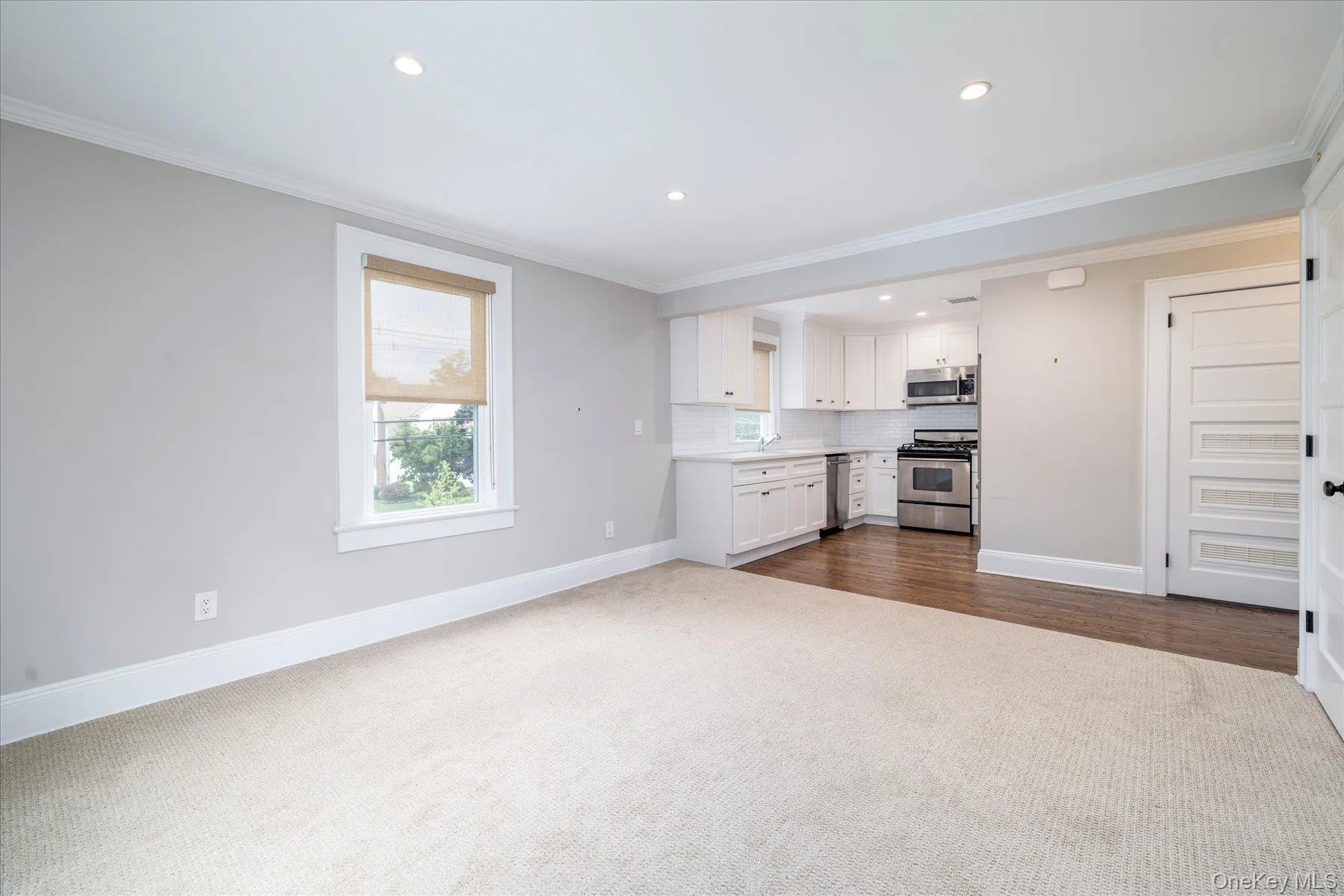 Add'l view of Living Room into the Kitchen Add'l view of Living Room into the Kitchen