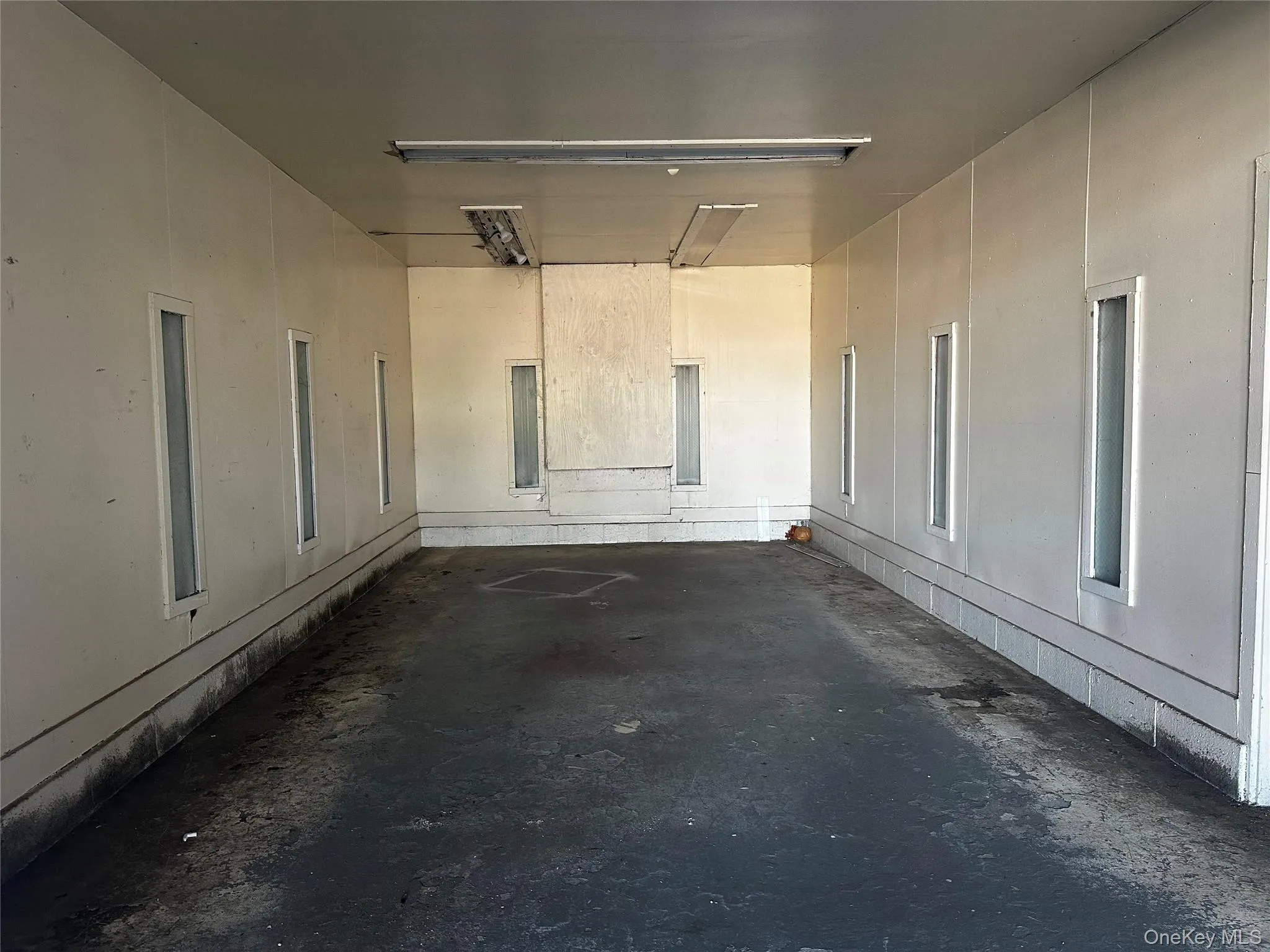 Smaller Spaces in the back could be customized for your needs (formerly a paint room). Smaller Spaces in the back could be customized for your needs (formerly a paint room).
