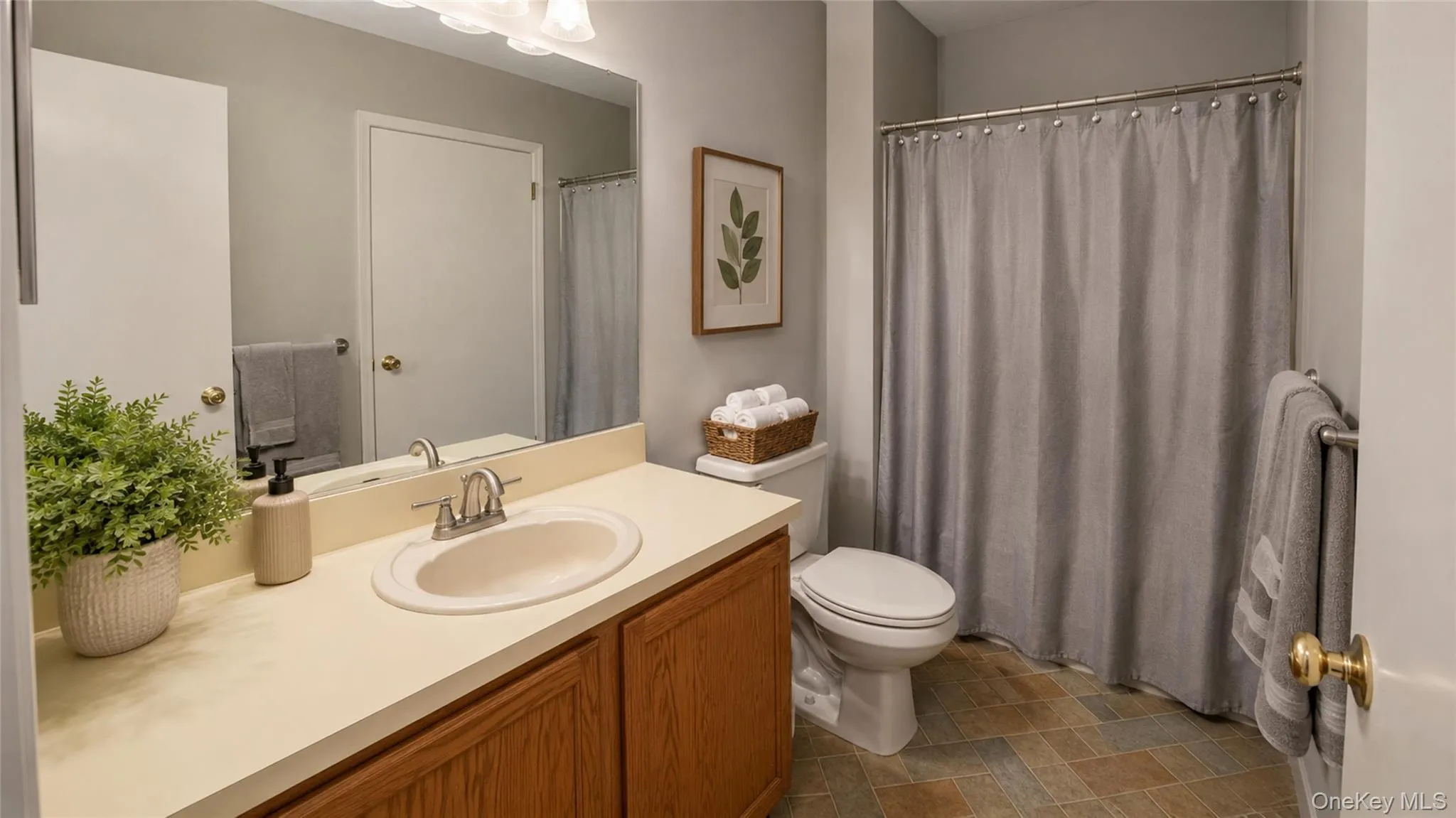 Bright full bathroom with a spacious vanity, tub/shower combination, and neutral finishes for a clean, comfortable presentation. Bright full bathroom with a spacious vanity, tub/shower combination, and neutral finishes for a clean, comfortable presentation.