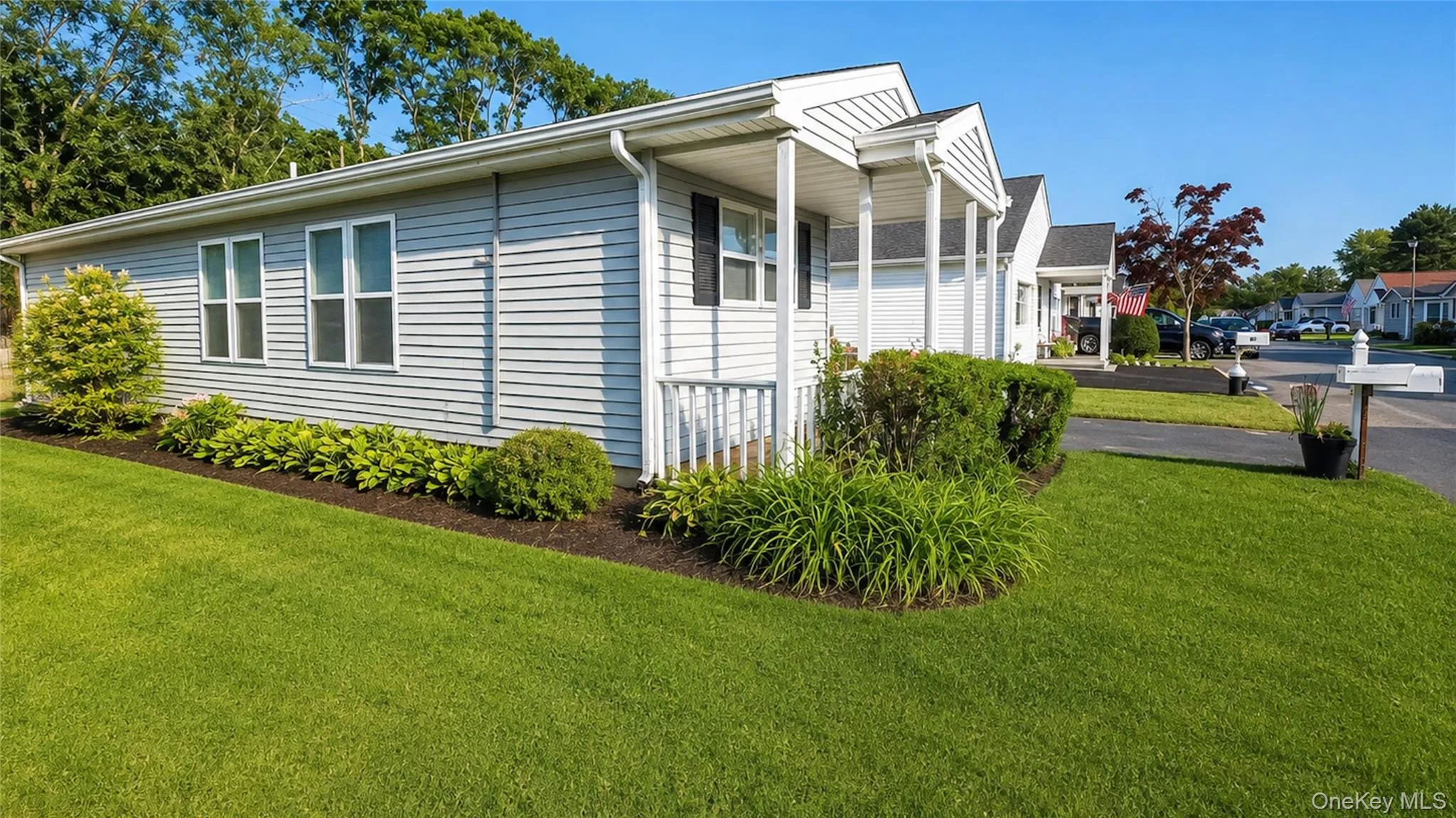 Well-maintained exterior with established landscaping, manicured lawn, and attractive curb appeal. Well-maintained exterior with established landscaping, manicured lawn, and attractive curb appeal.