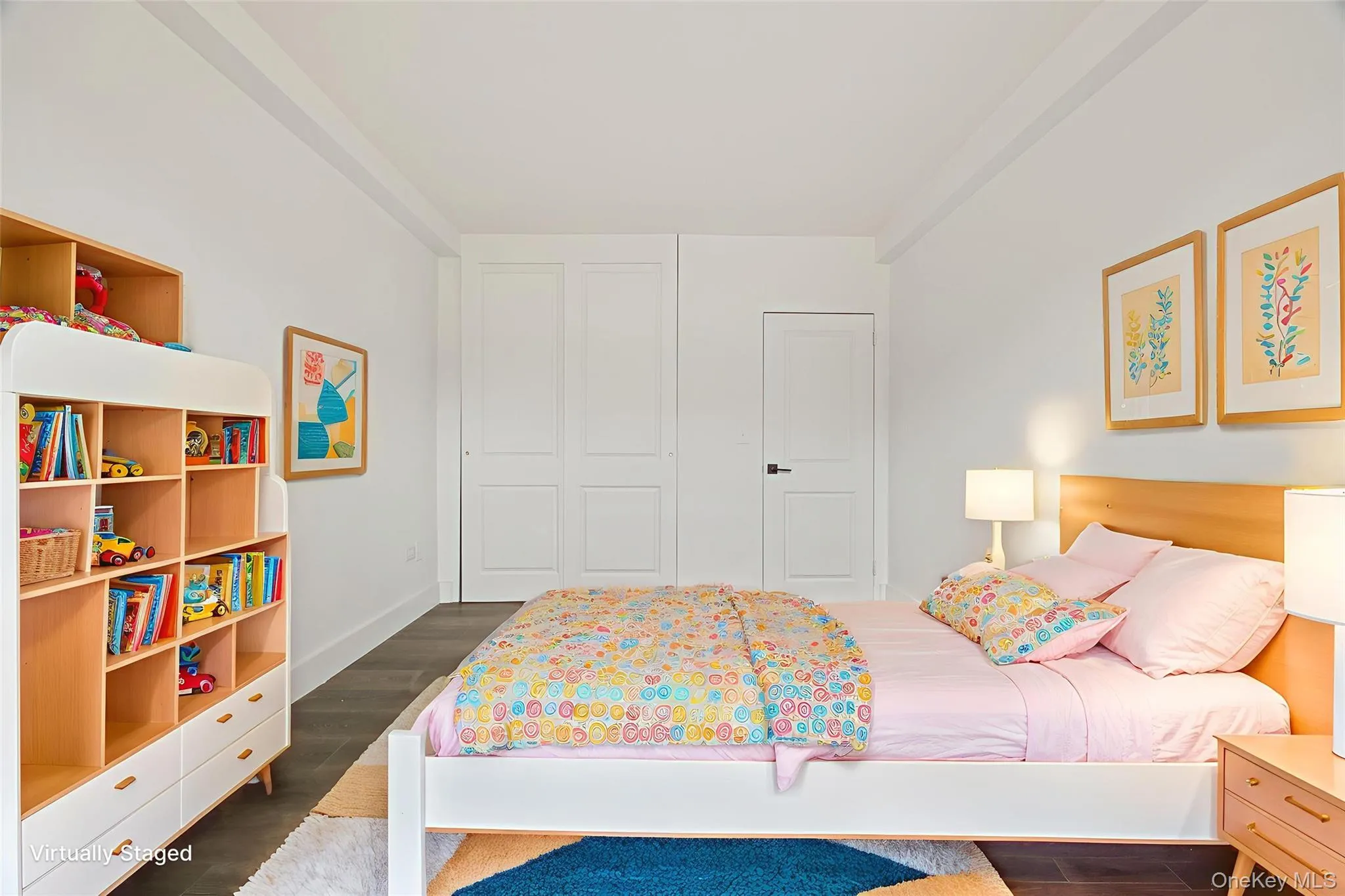 Recessed lighting, vinyl flooring, white walls, built-in shelving, and a paneled door Recessed lighting, vinyl flooring, white walls, built-in shelving, and a paneled door