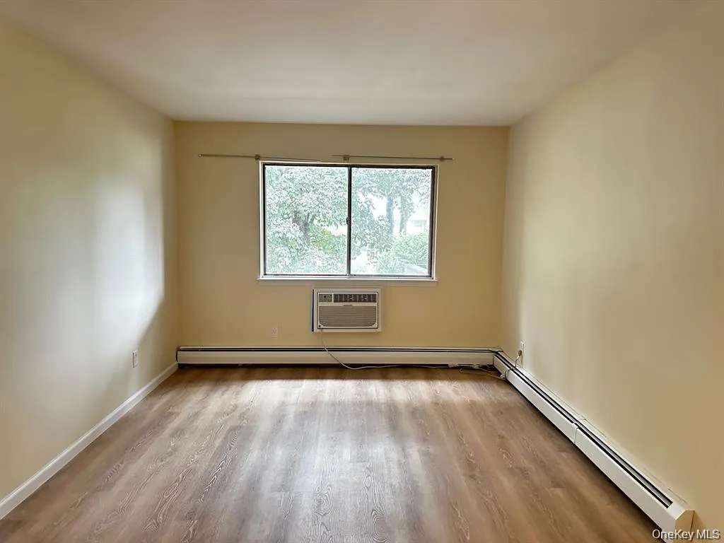 Spacious bedroom with natural light and a walk-in closet offering plenty of storage. Spacious bedroom with natural light and a walk-in closet offering plenty of storage.