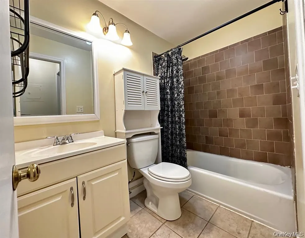 Full bath with tub/shower combination and vanity with additional storage. Full bath with tub/shower combination and vanity with additional storage.