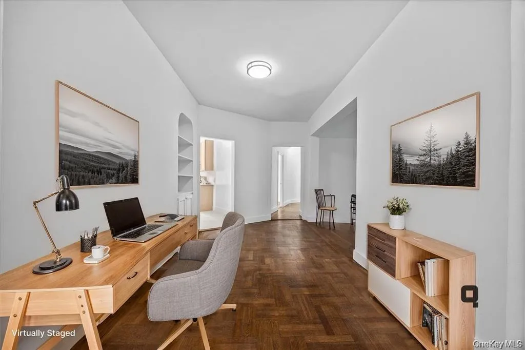 Herringbone wood-finish flooring, white painted walls, recessed archway shelving, and flush-mount ceiling lighting Herringbone wood-finish flooring, white painted walls, recessed archway shelving, and flush-mount ceiling lighting