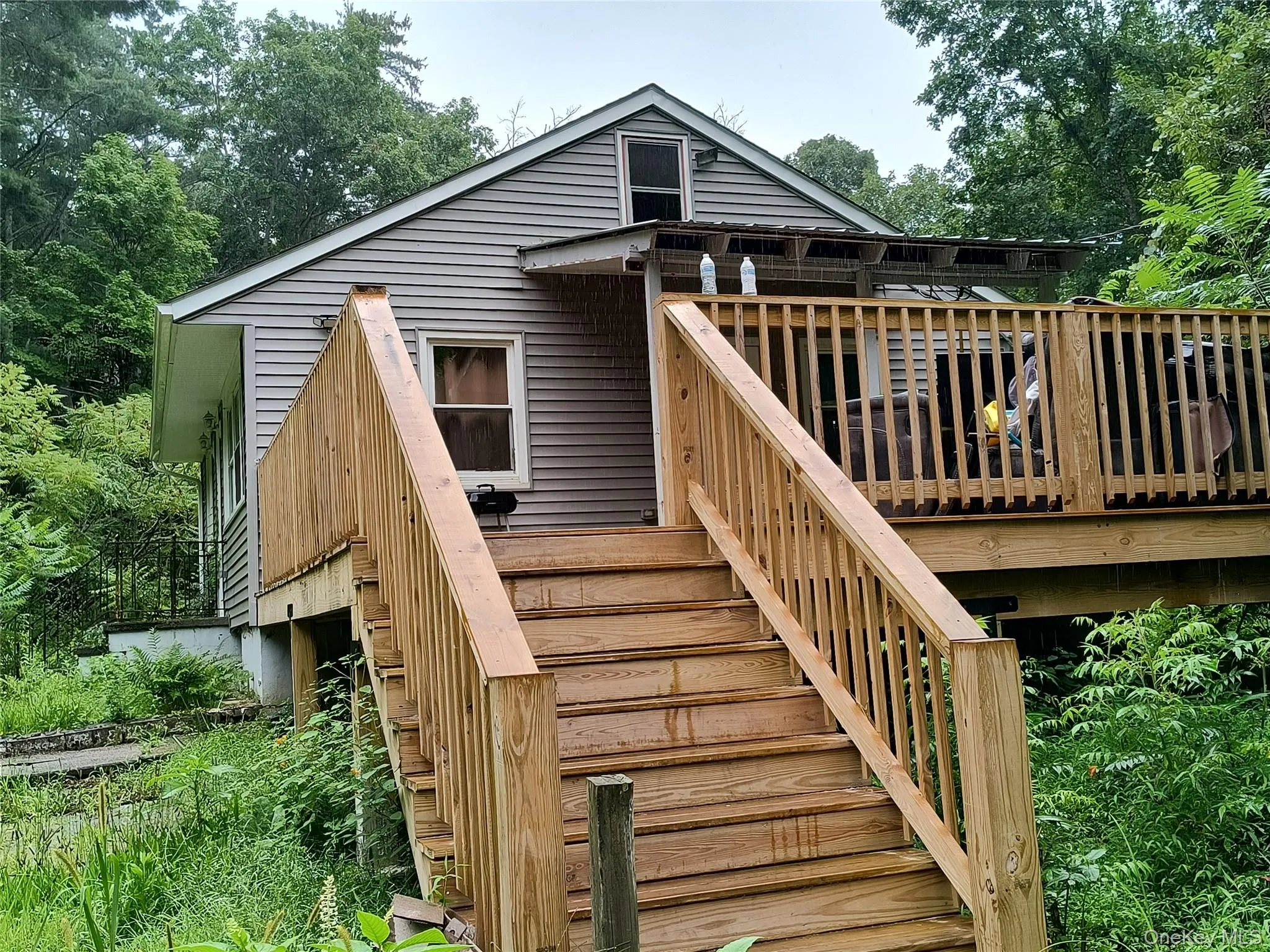 You'll love this deck! Part of it is covered for those rainy days. You'll love this deck! Part of it is covered for those rainy days.