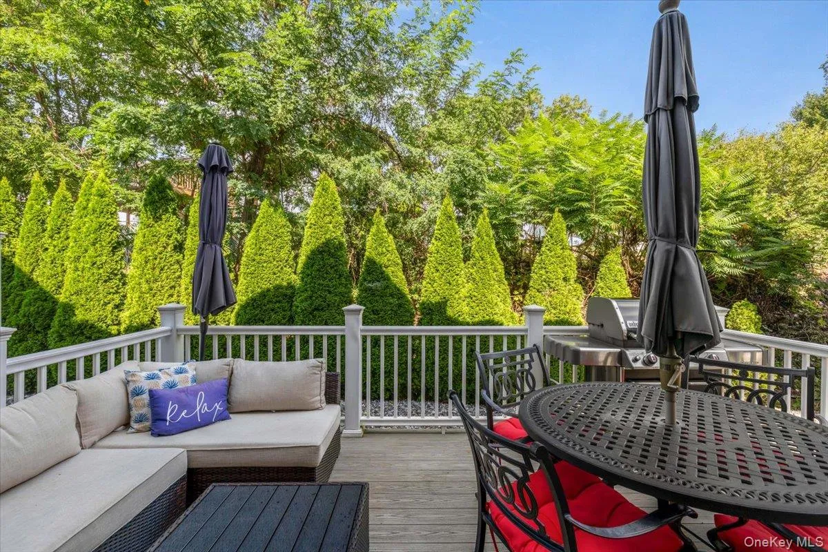 Private deck surrounded by mature landscaping Private deck surrounded by mature landscaping