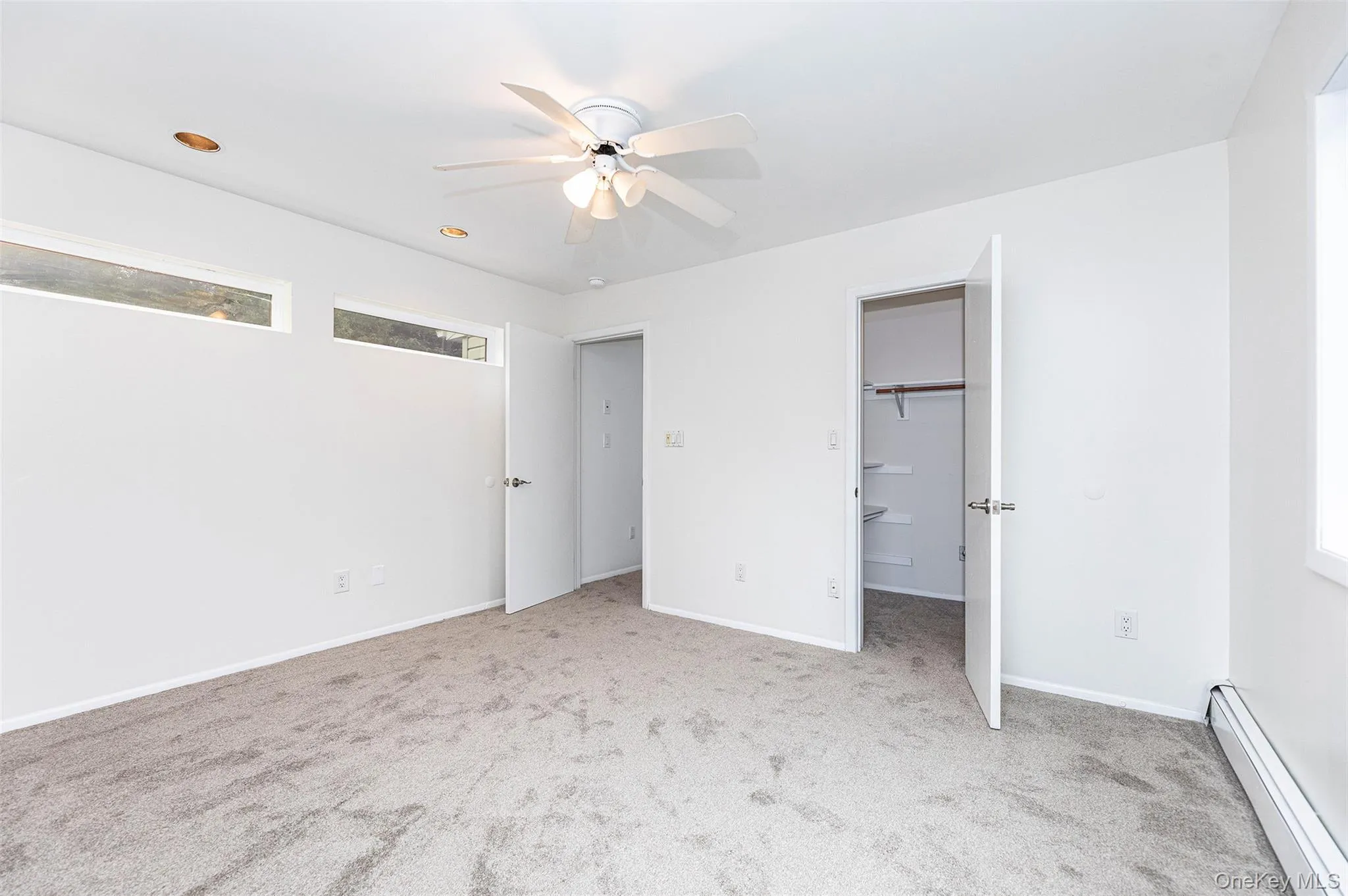 Second floor bedroom with large walk in closet. Second floor bedroom with large walk in closet.