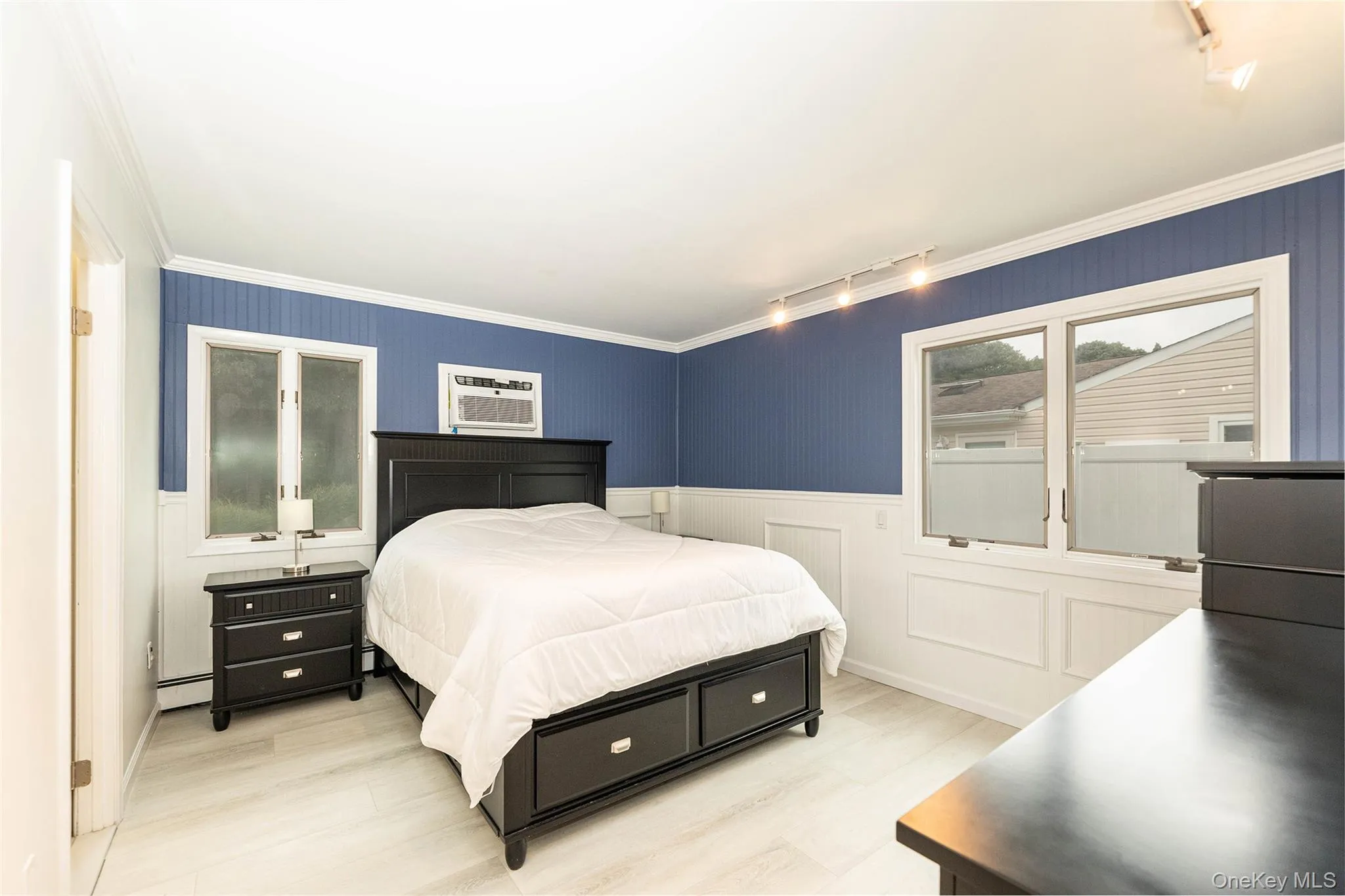 First floor primary with 1/2 bath en suite First floor primary with 1/2 bath en suite